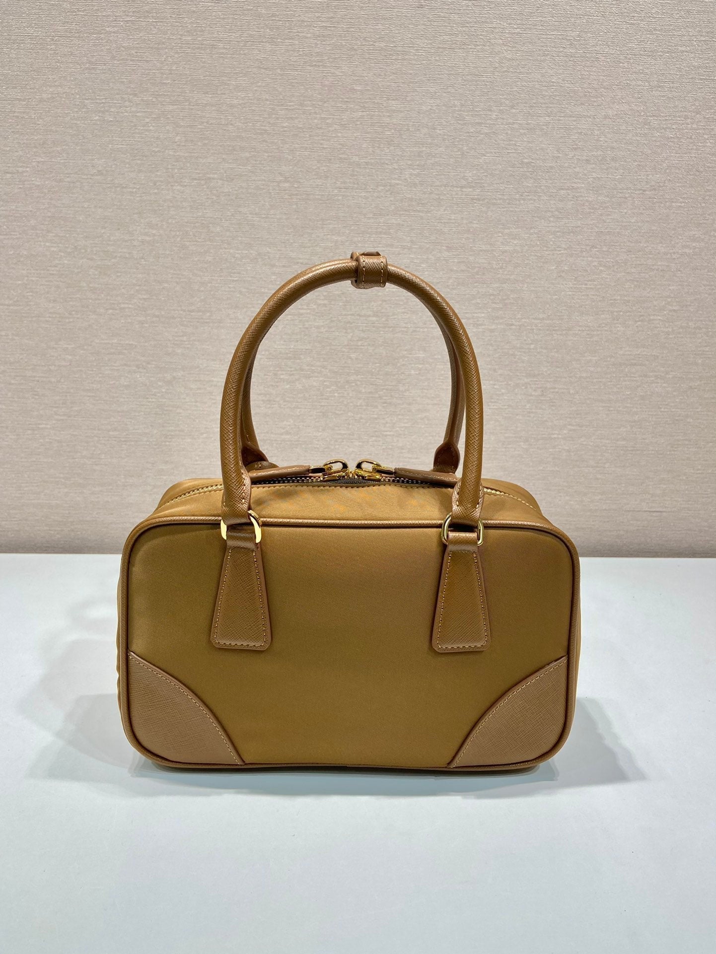 PRADA SMALL TOP HANDLE BAG 25 IN GOLDEN BROWN NYLON AND CALFSKIN TRIM