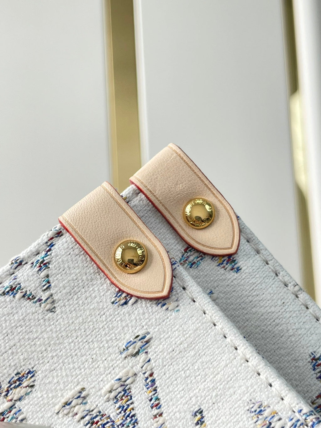 LOUIS VUITTON ONTHEGO MM 35 IN WHITE MONOGRAM JACQUARD FABRIC