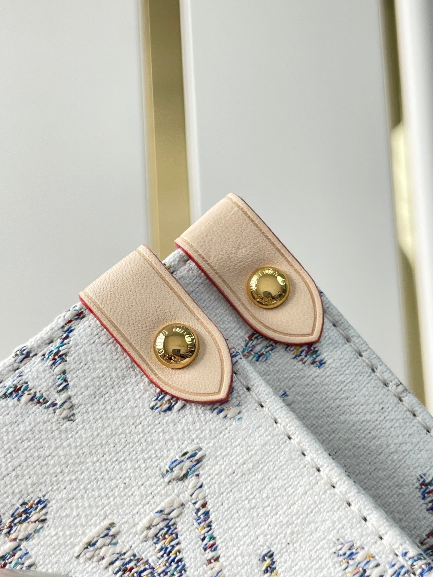 LOUIS VUITTON ONTHEGO MM 35 IN WHITE MONOGRAM JACQUARD FABRIC