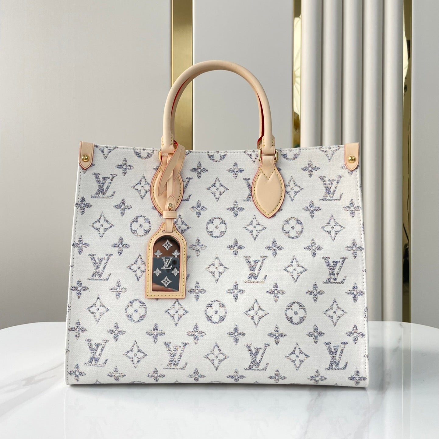 LOUIS VUITTON ONTHEGO MM 35 IN WHITE MONOGRAM JACQUARD FABRIC