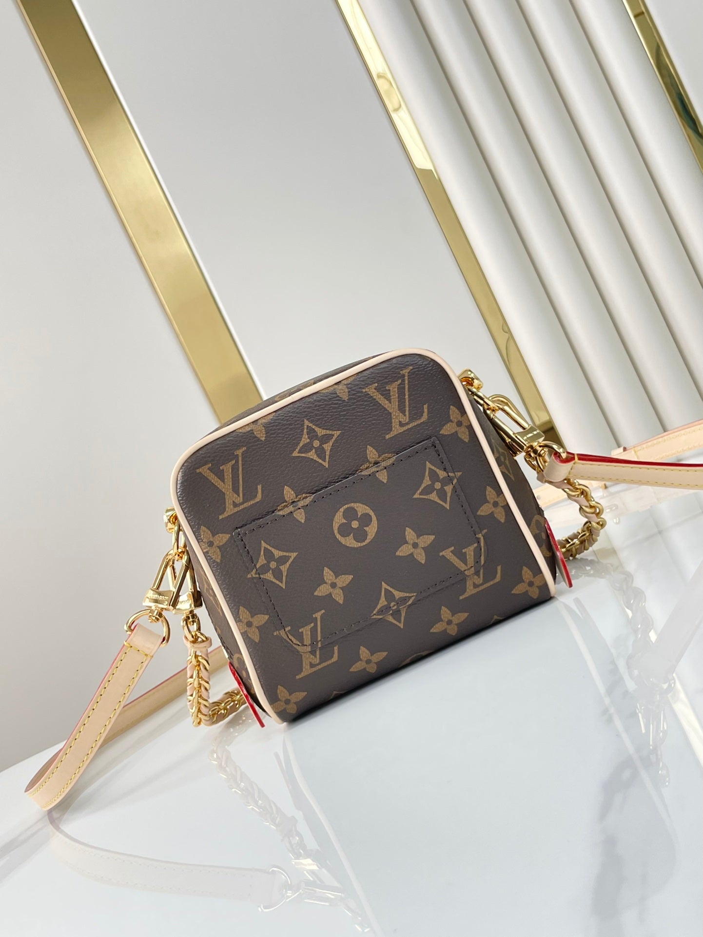 LOUIS VUITTON JUST IN CASE 14 IN BROWN MONOGRAM CANVAS GOLD HARDWARE