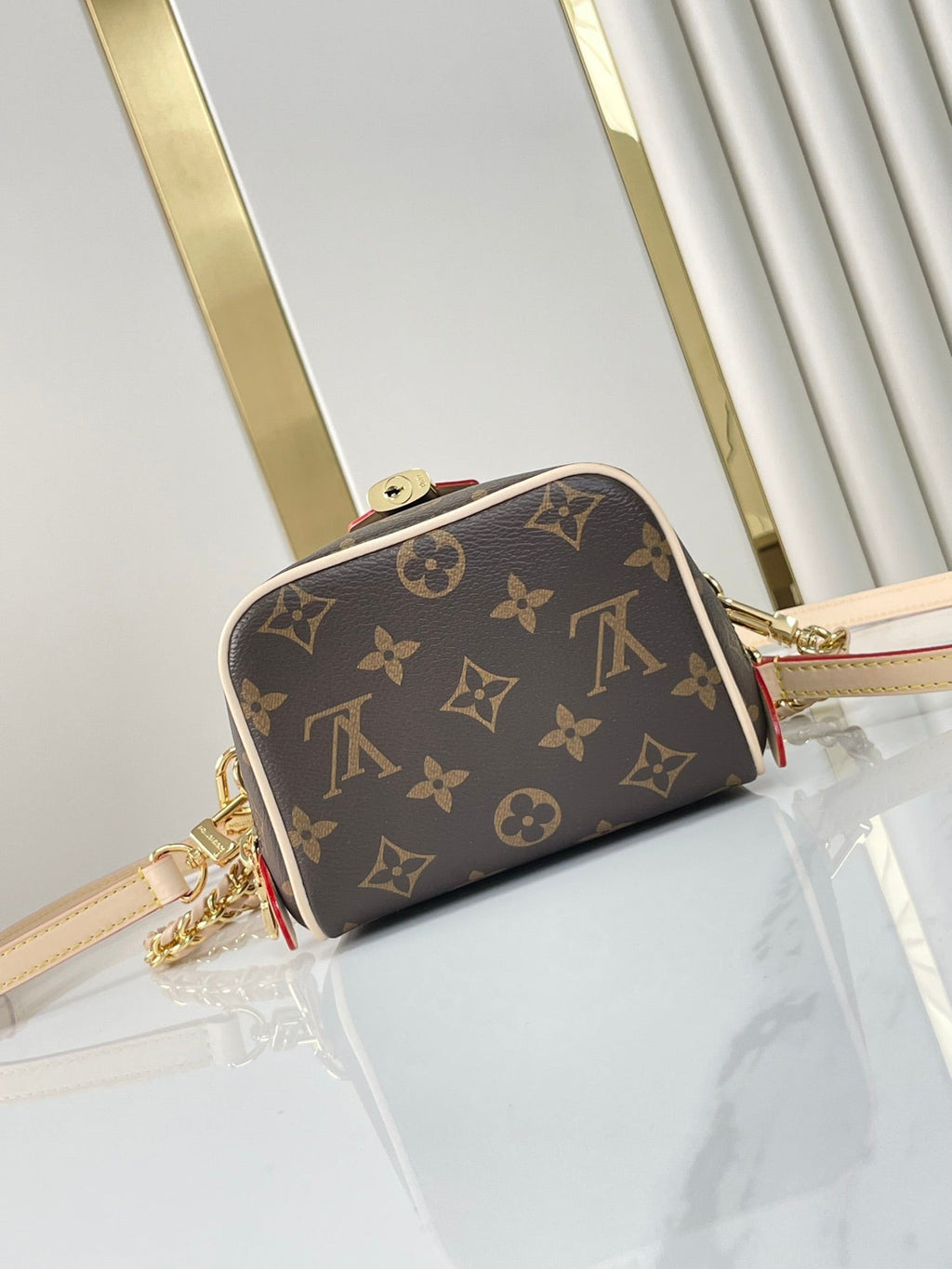LOUIS VUITTON JUST IN CASE 14 IN BROWN MONOGRAM CANVAS GOLD HARDWARE
