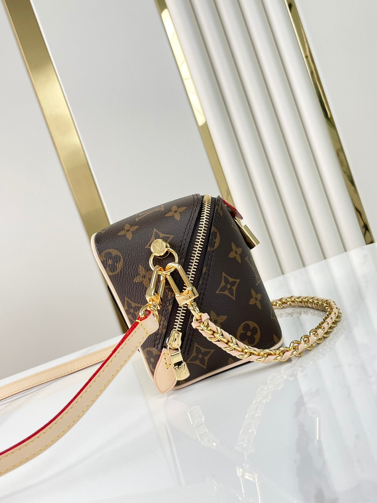 LOUIS VUITTON JUST IN CASE 14 IN BROWN MONOGRAM CANVAS GOLD HARDWARE