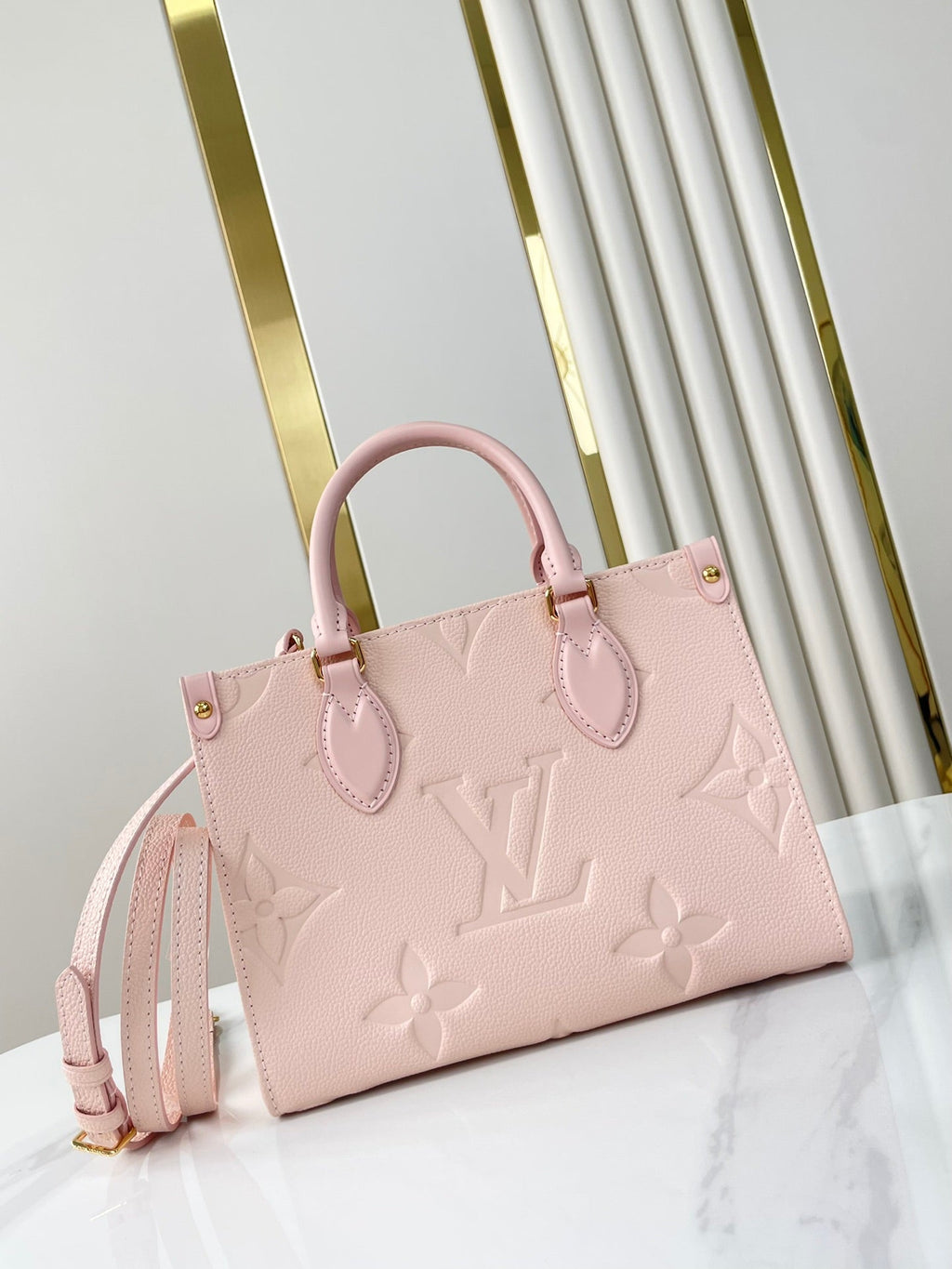 LOUIS VUITTON ONTHEGO PM 25 IN OPALE PINK MONOGRAM EMPREINTE LEATHER