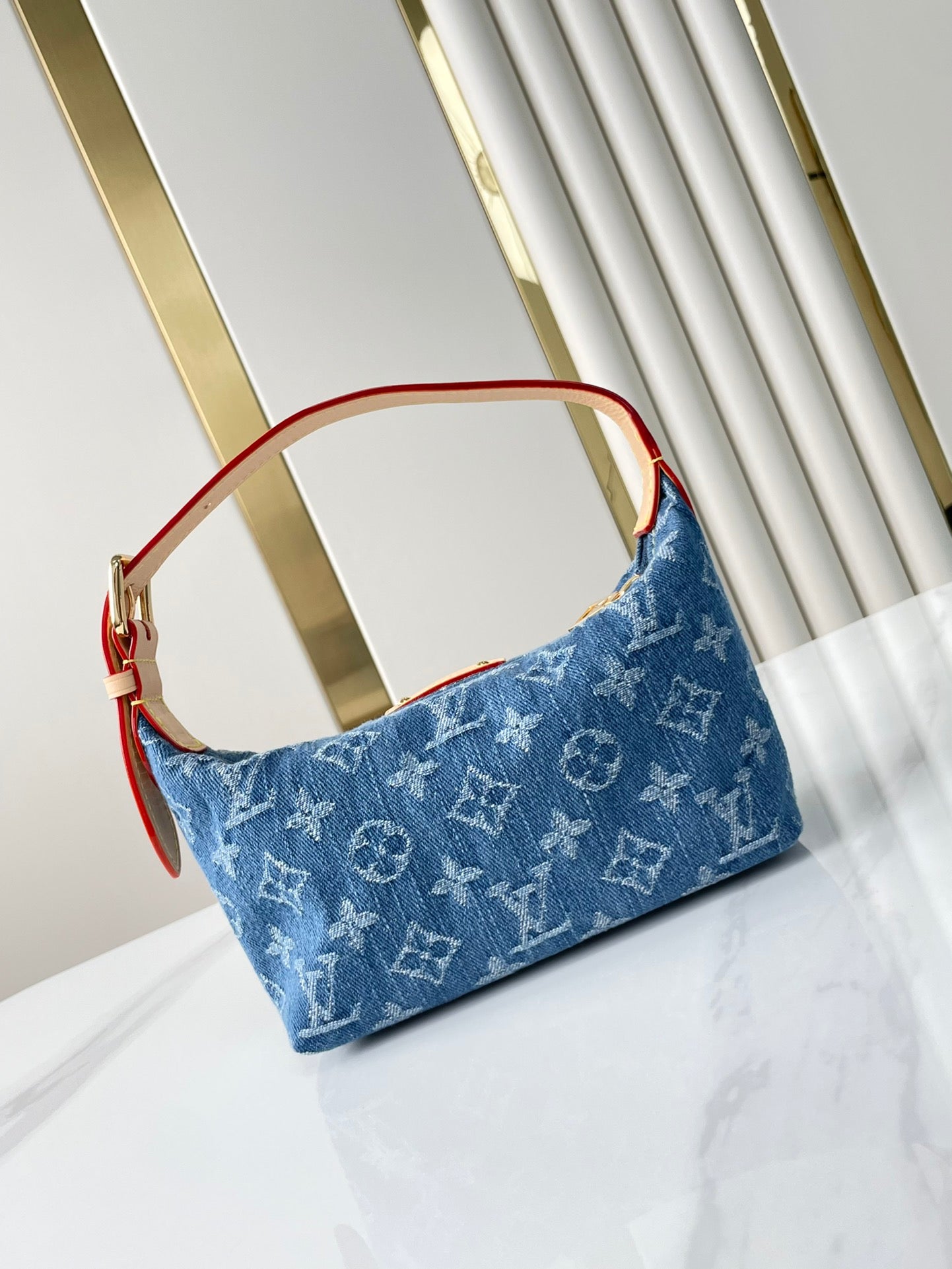 LOUIS VUITTON HILLS POCHETTE 18 IN BLUE MONOGRAM DENIM