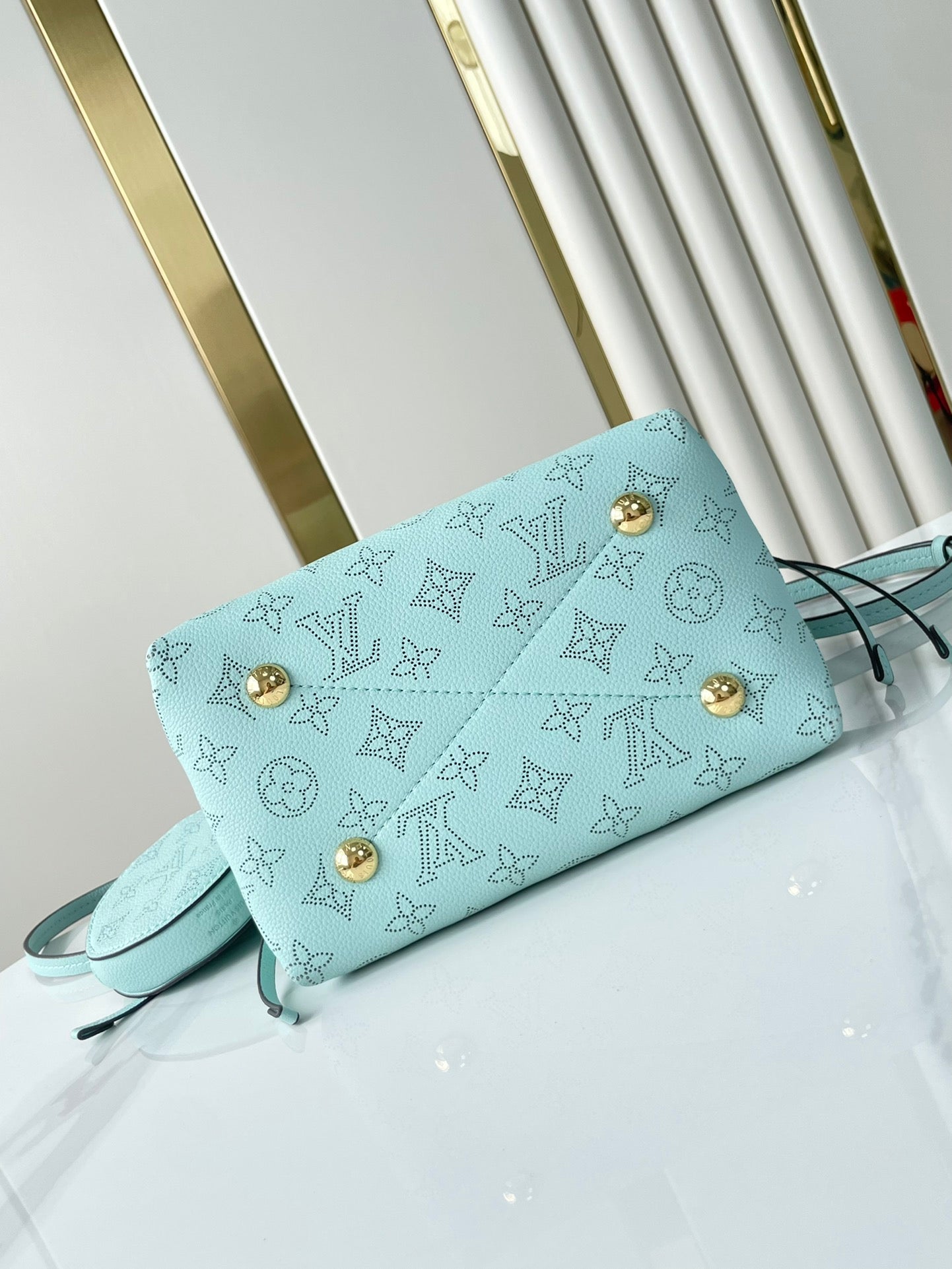 LOUIS VUITTON BELLA 22 IN SKY BLUE MONOGRAM PERFORATED CALFSKIN