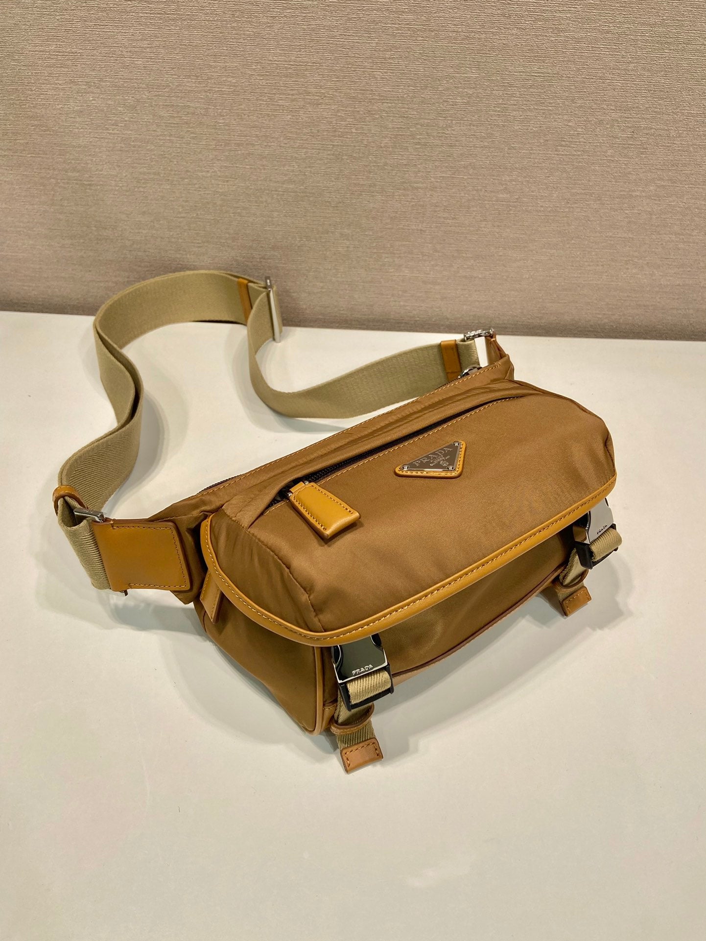 PRADA MESSENGER BAG 20 IN CIDER BROWN RE-NYLON AND CALFSKIN TRIM