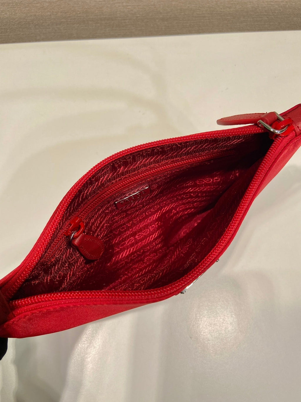 PRADA SHOULDER BAG 24 WITH TRIANGLE LOGO IN PASSION RED RE-NYLON FABRIC