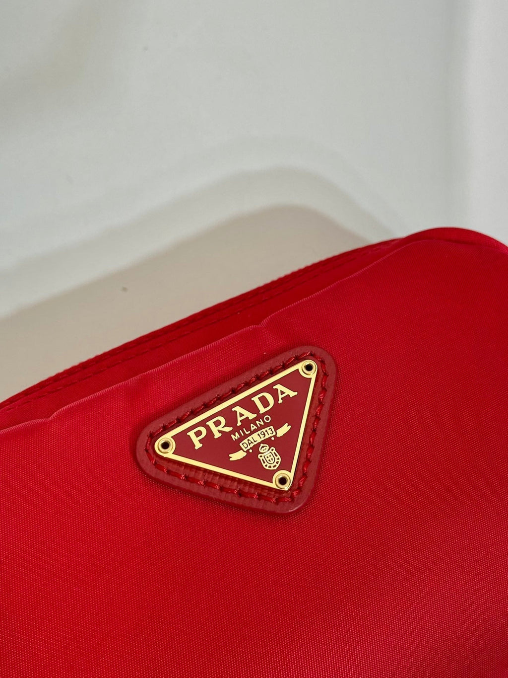 PRADA CLUTCH 12 IN PASSION RED RE-NYLON