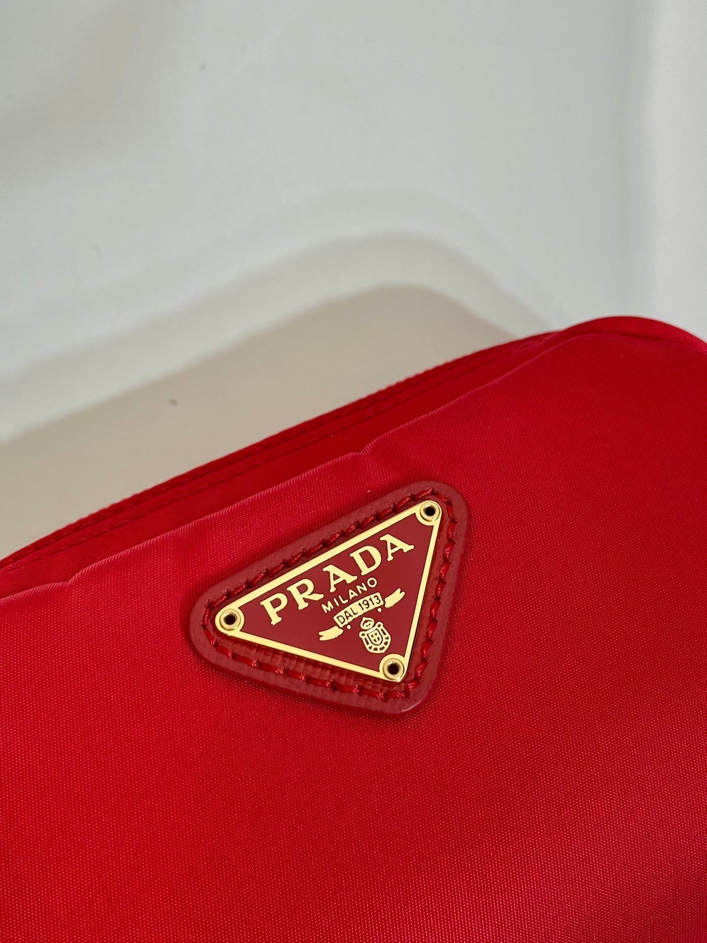 PRADA CLUTCH 12 IN PASSION RED RE-NYLON