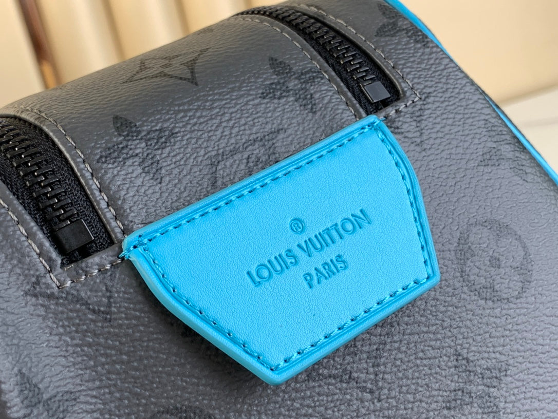 LOUIS VUITTON DOPP KIT 28 IN GUN METAL MONOGRAM ECLIPSE CANVAS AND TURQUOISE CALFSKIN TRIM