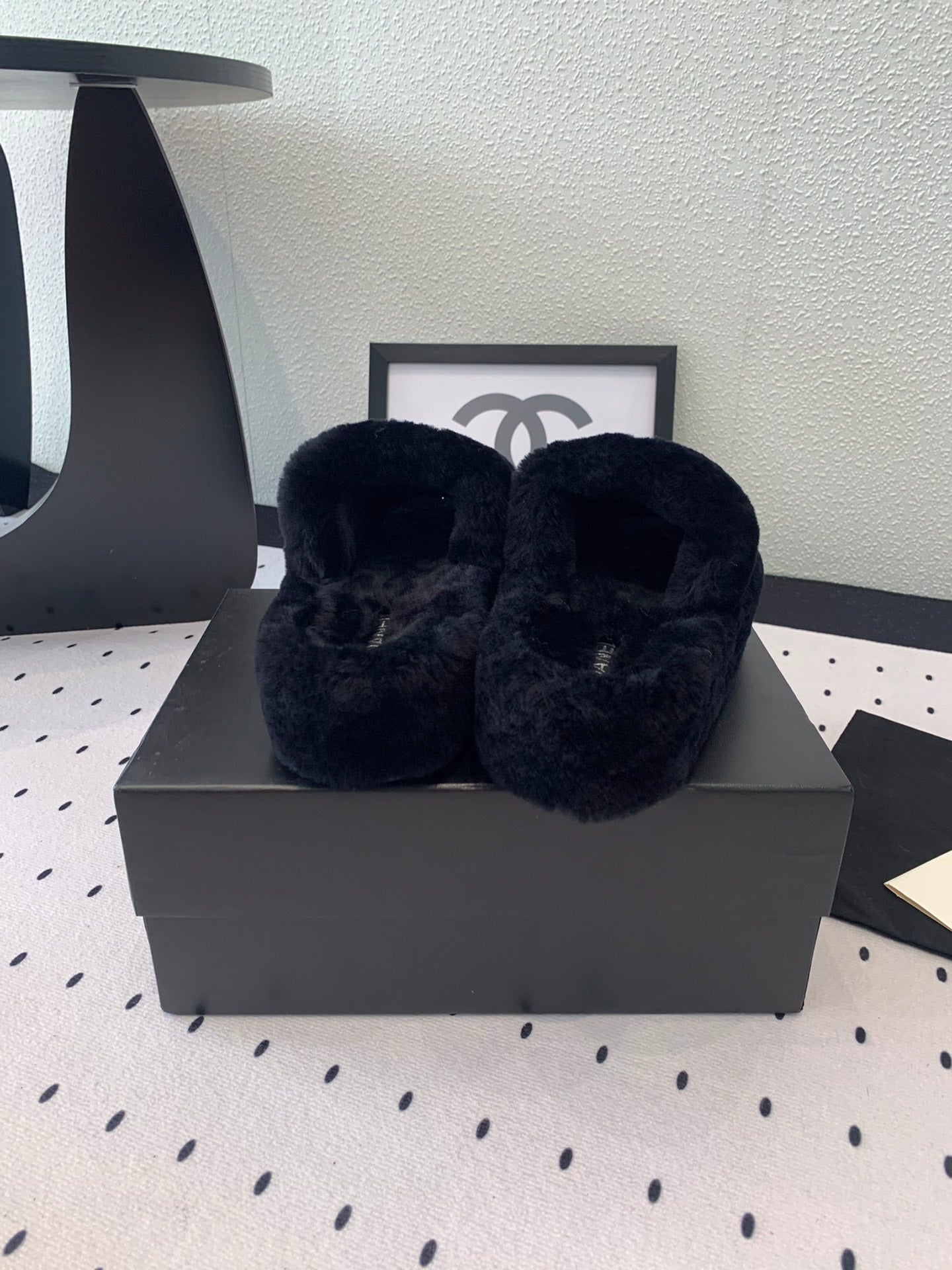 CHANEL THICK-SOLED SLIPPERS IN BLACK SHEEP WOOL