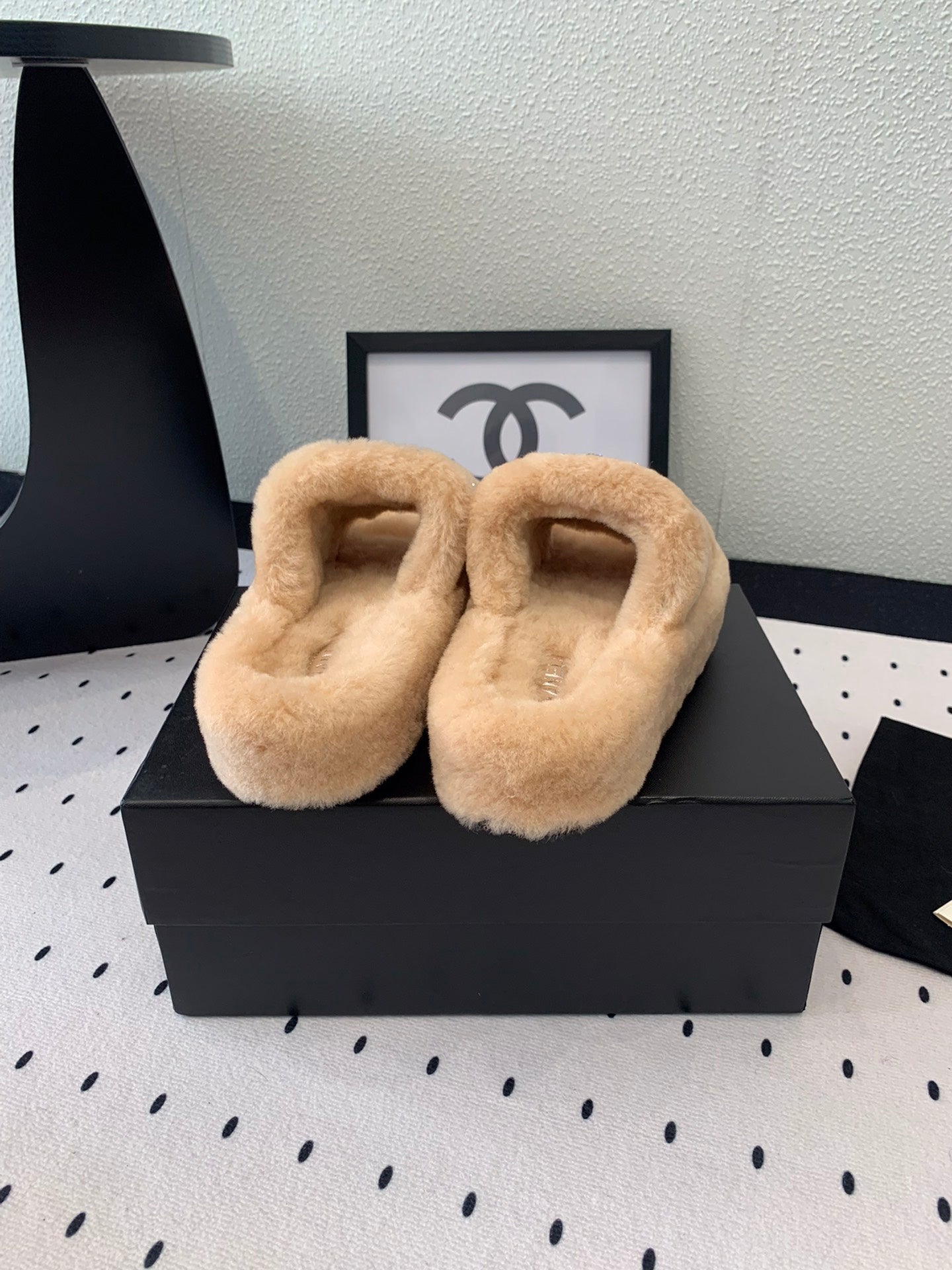 CHANEL THICK-SOLED SLIPPERS IN BRIGHT CREAM SHEEP WOOL