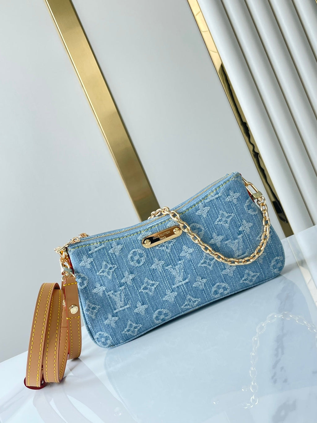 LOUIS VUITTON LIV POCHETTE 24 IN BLUE MONOGRAM DENIM GOLD HARDWARE