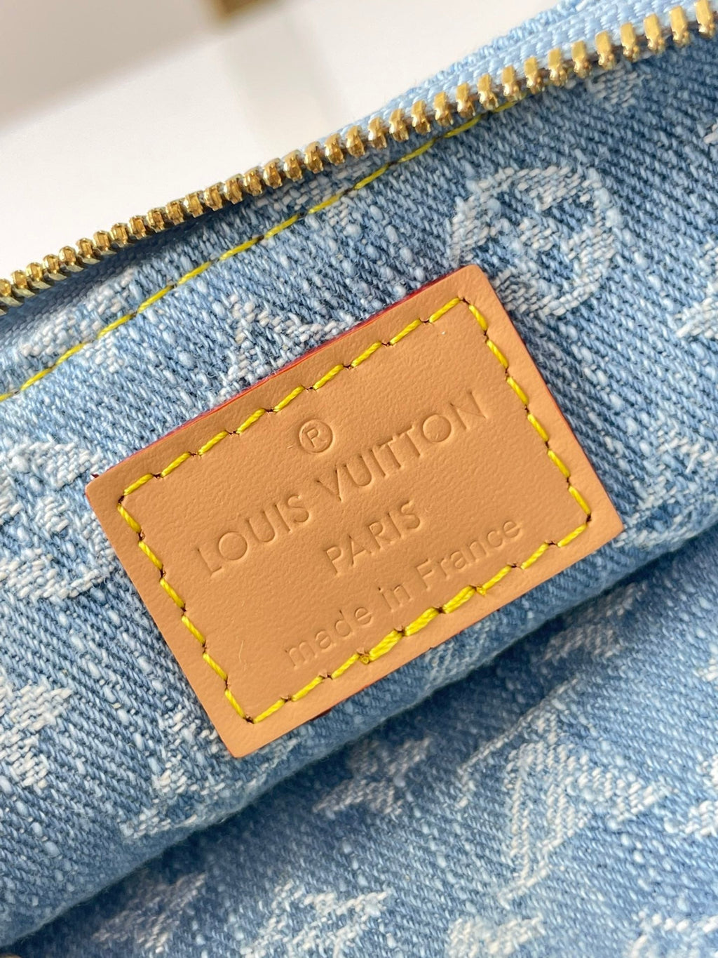 LOUIS VUITTON LIV POCHETTE 24 IN BLUE MONOGRAM DENIM GOLD HARDWARE