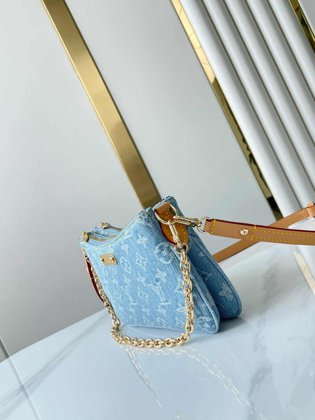 LOUIS VUITTON LIV POCHETTE 24 IN BLUE MONOGRAM DENIM GOLD HARDWARE