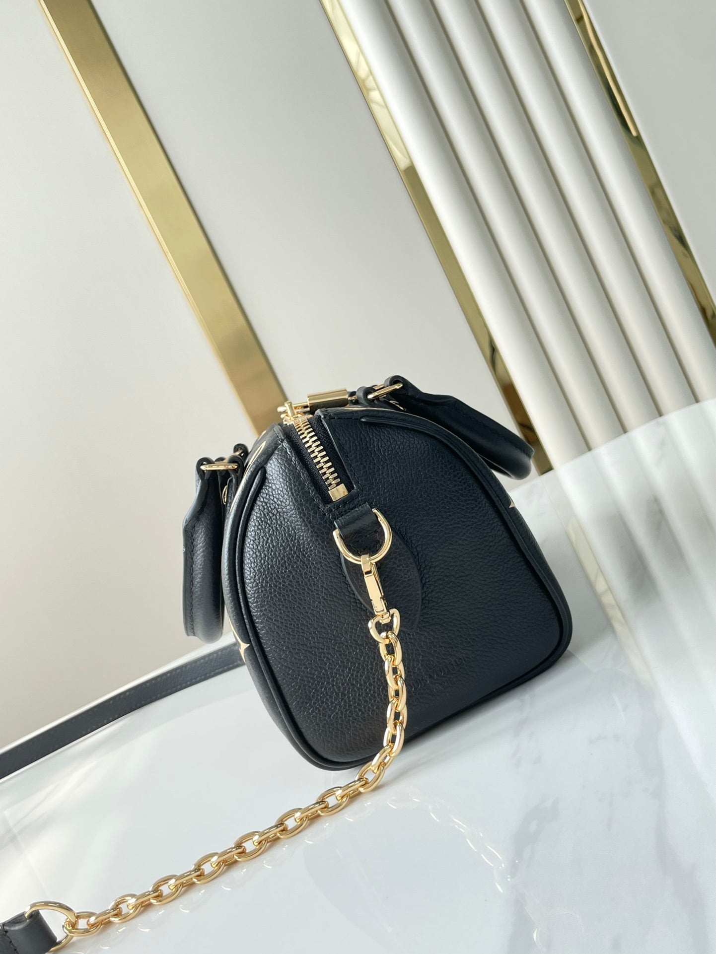 LOUIS VUITTON SPEEDY BANDOULIÈRE 20 IN BLACK CREAM MONOGRAM EMPREINTE LEATHER GOLD HARDWARE