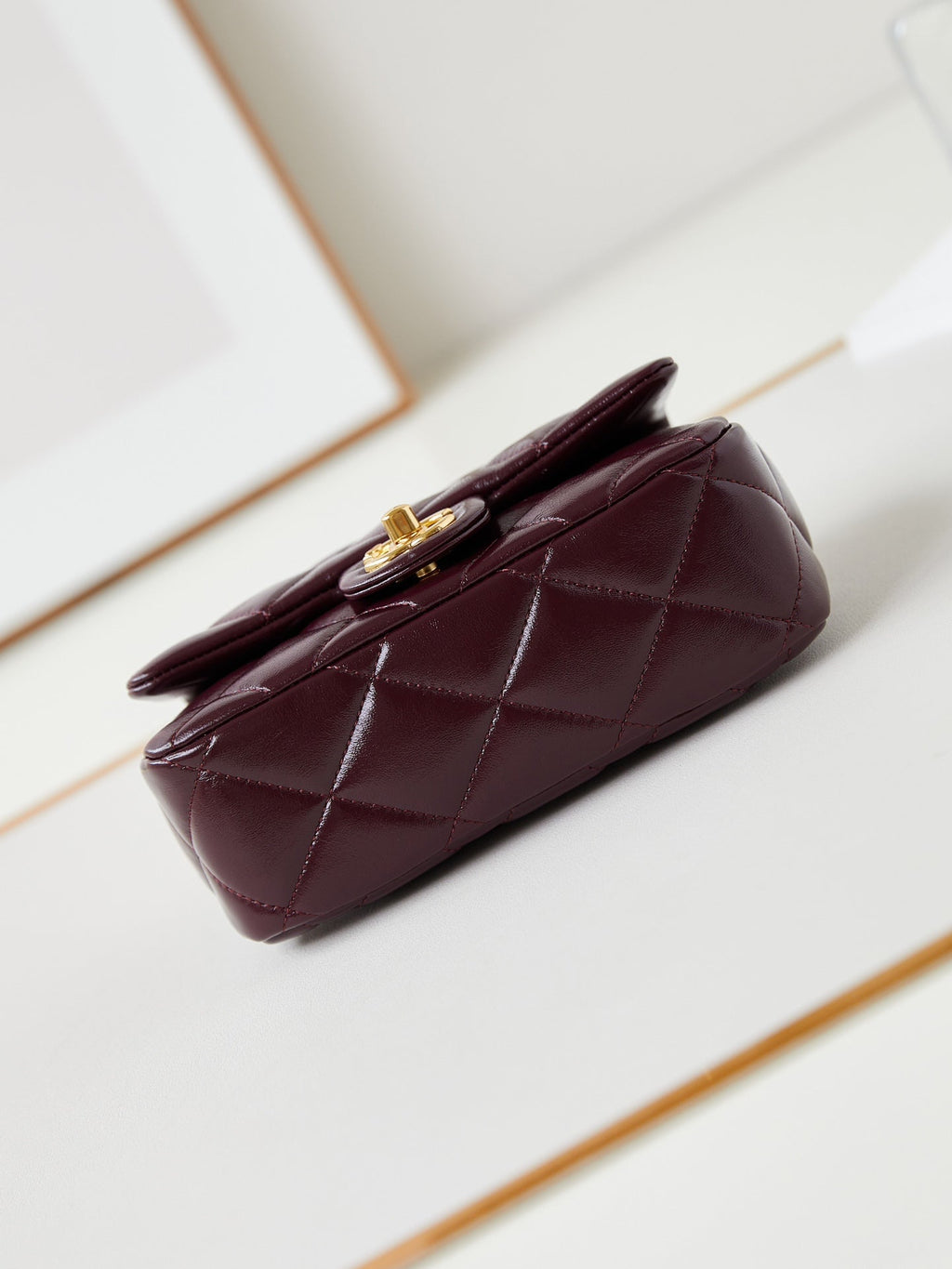CHANEL FLAP BAG WITH TOP HANDLE 18 IN WINE RED OIL-WAX LAMBSKIN GOLD HARDWARE