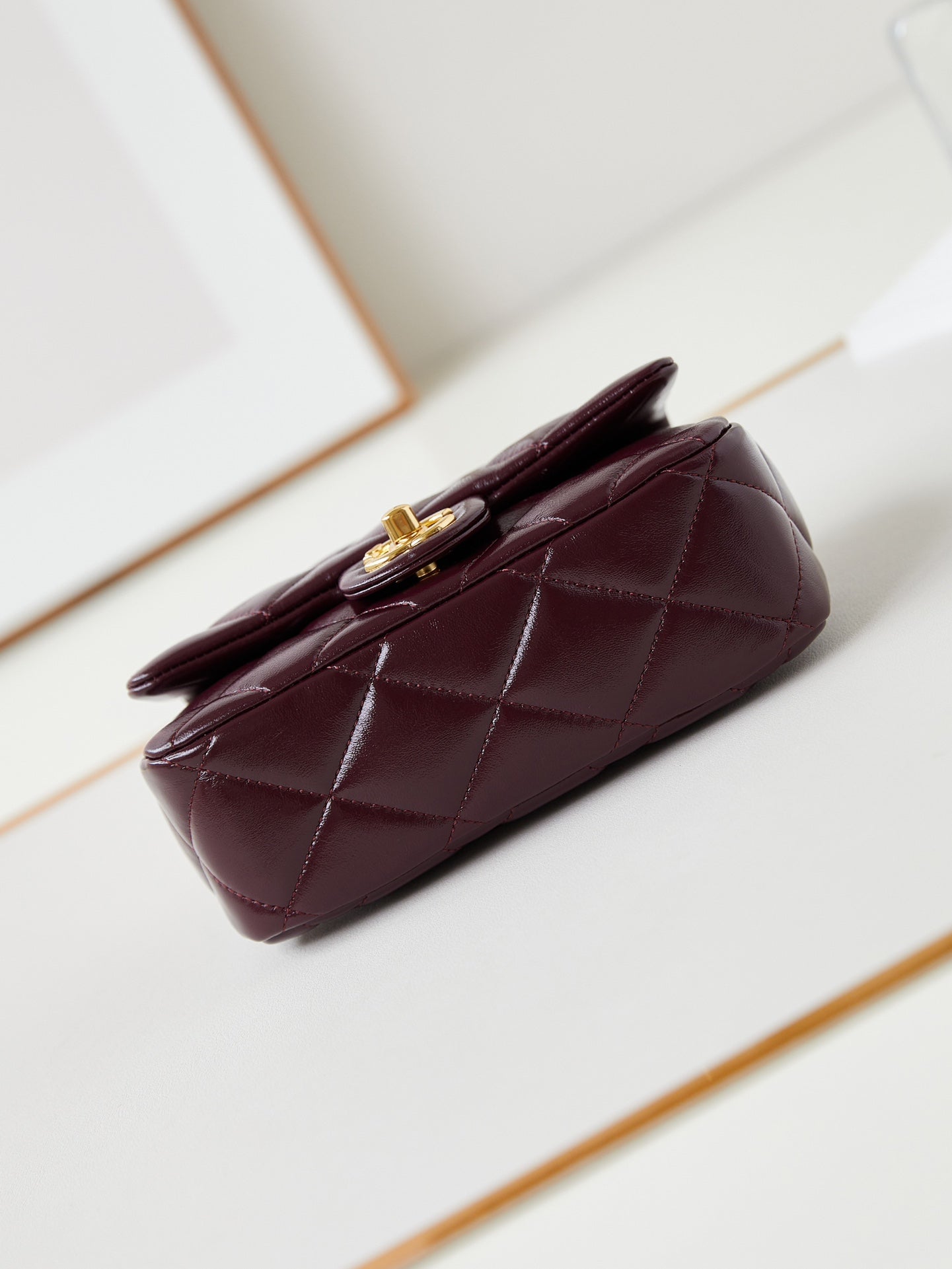CHANEL FLAP BAG WITH TOP HANDLE 18 IN WINE RED OIL-WAX LAMBSKIN GOLD HARDWARE