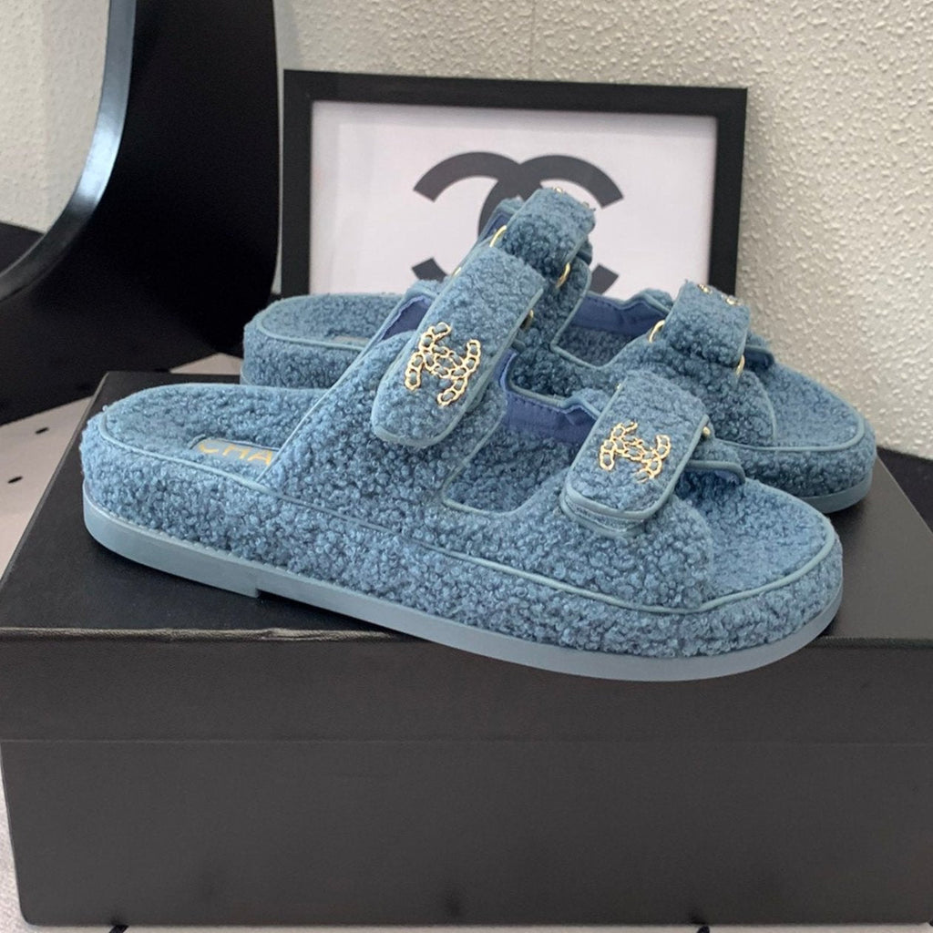 CHANEL DAD SANDAL MULE IN AEGEAN BLUE LAMB FUR
