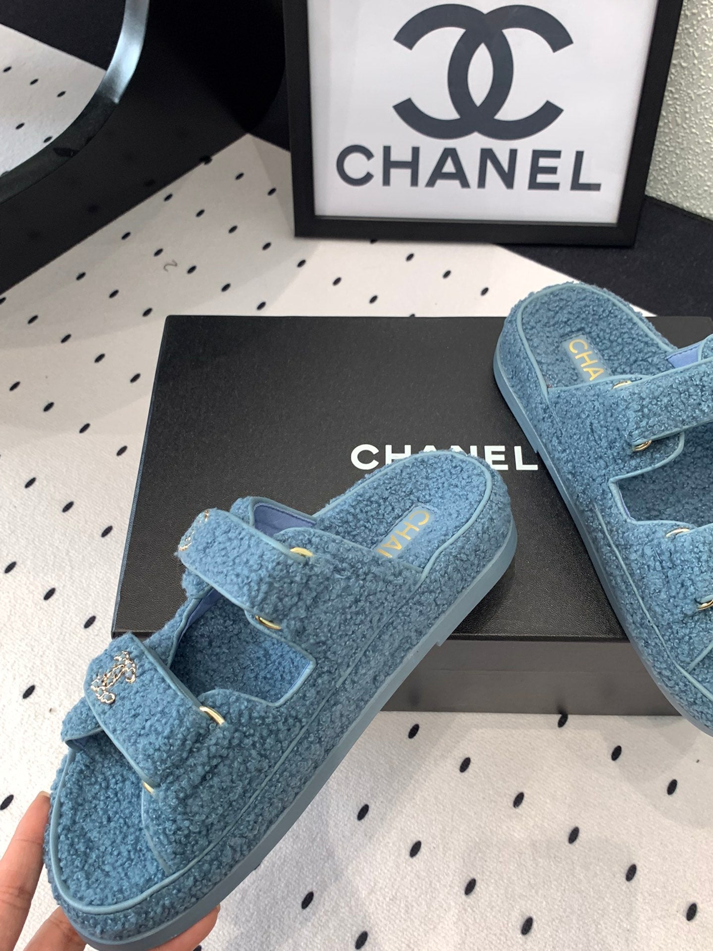 CHANEL DAD SANDAL MULE IN AEGEAN BLUE LAMB FUR