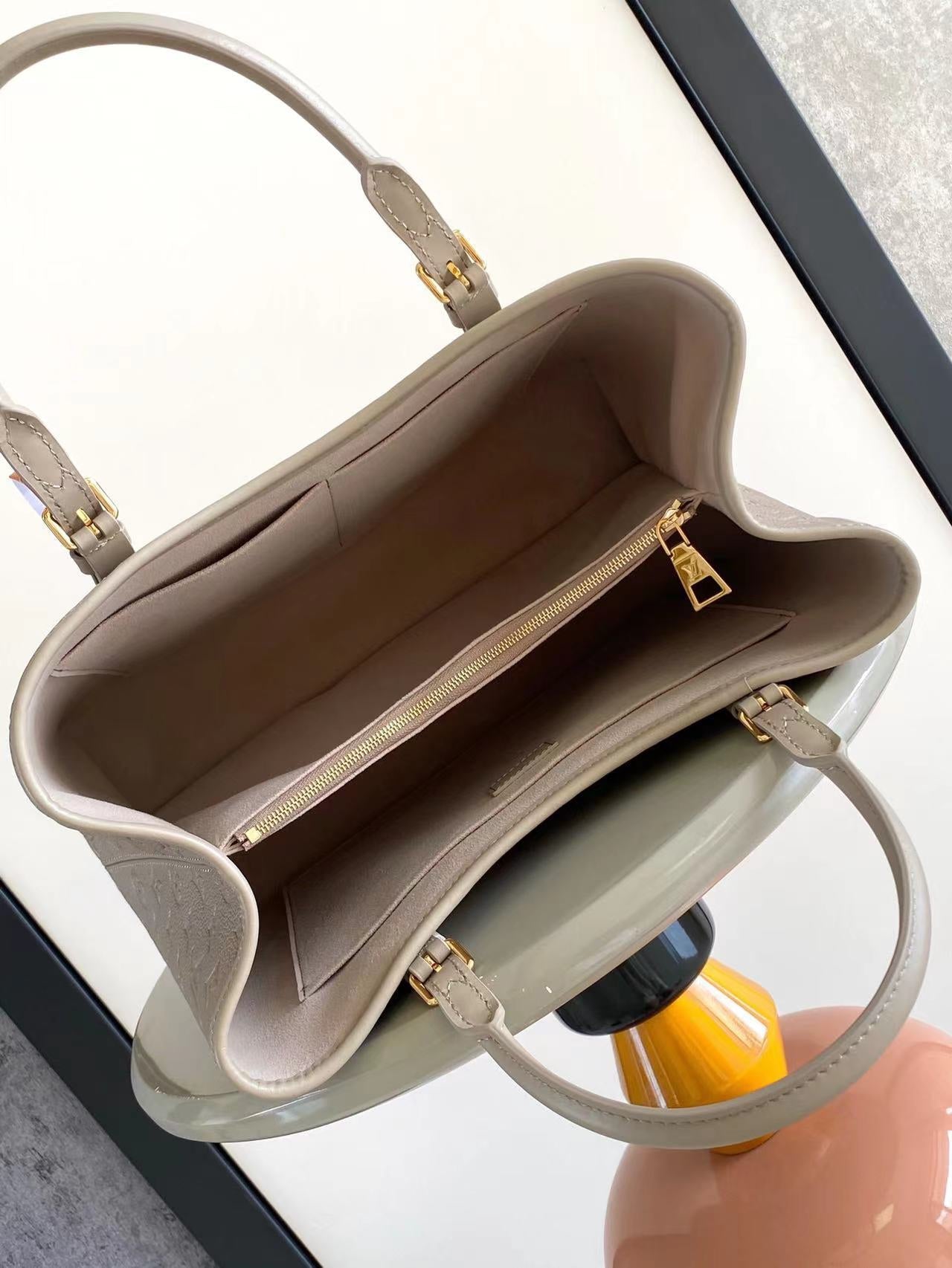 LOUIS VUITTON BABYLONE TOTE MM 39 IN TOURTERELLE MONOGRAM EMPREINTE LEATHER