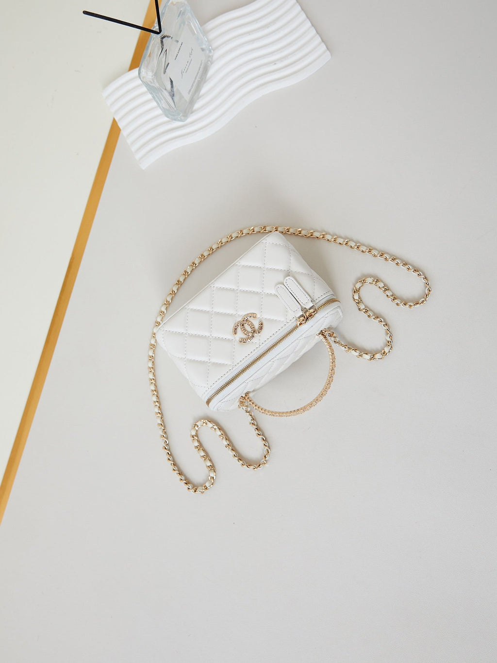 CHANEL 25S MINI VANITY BAG 16 CM IN WHITE LAMBSKIN WITH CRYSTAL-EMBELLISHED  LOGO