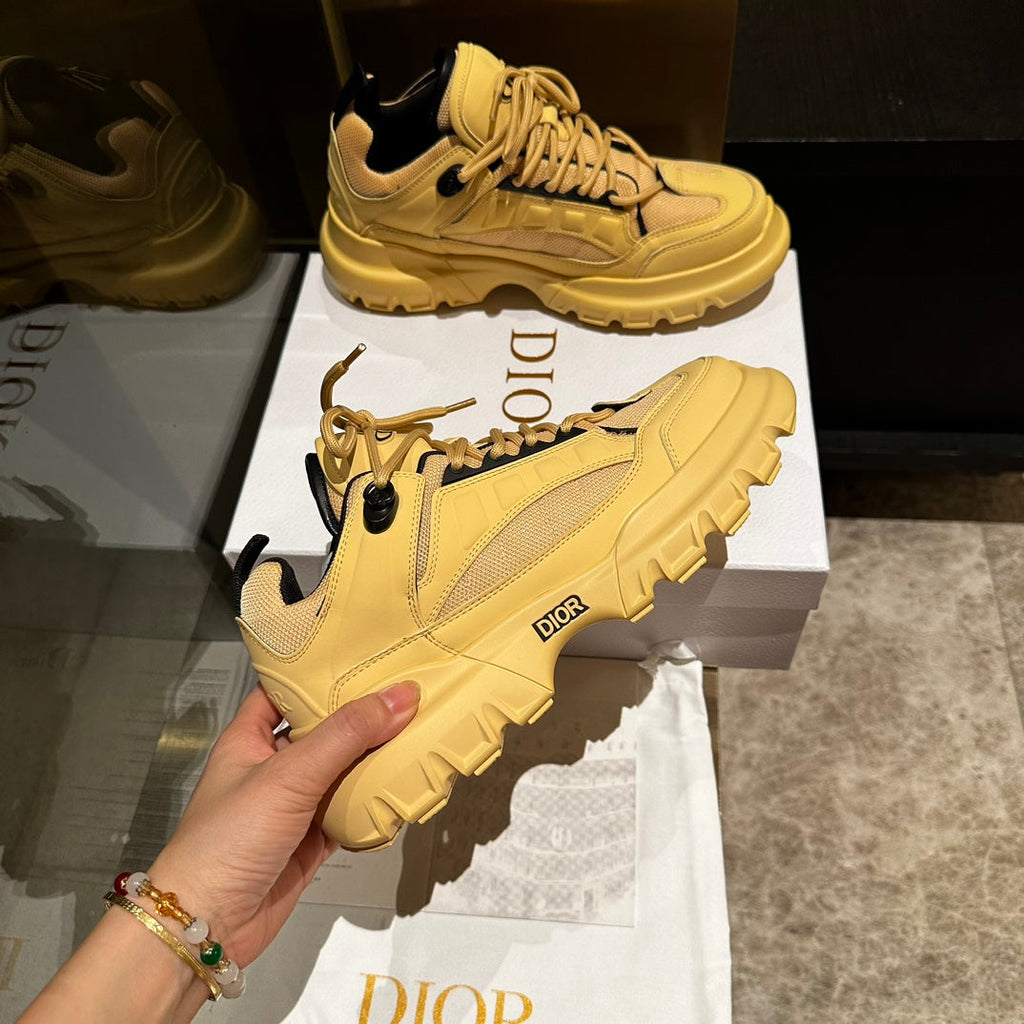 DIOR C'EST SNEAKER IN CLASSIC YELLOW CALFSKIN AND BREATHABLE MESH