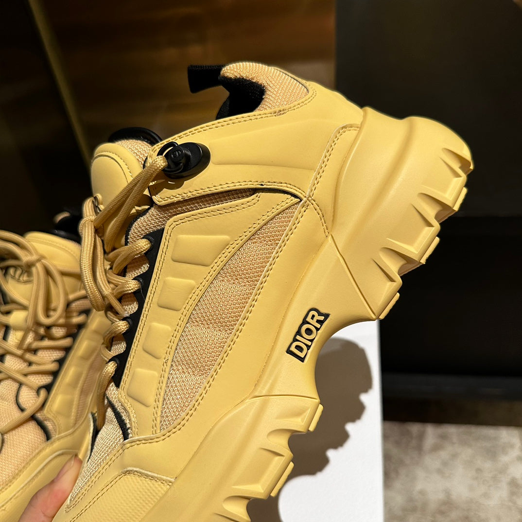 DIOR C'EST SNEAKER IN CLASSIC YELLOW CALFSKIN AND BREATHABLE MESH