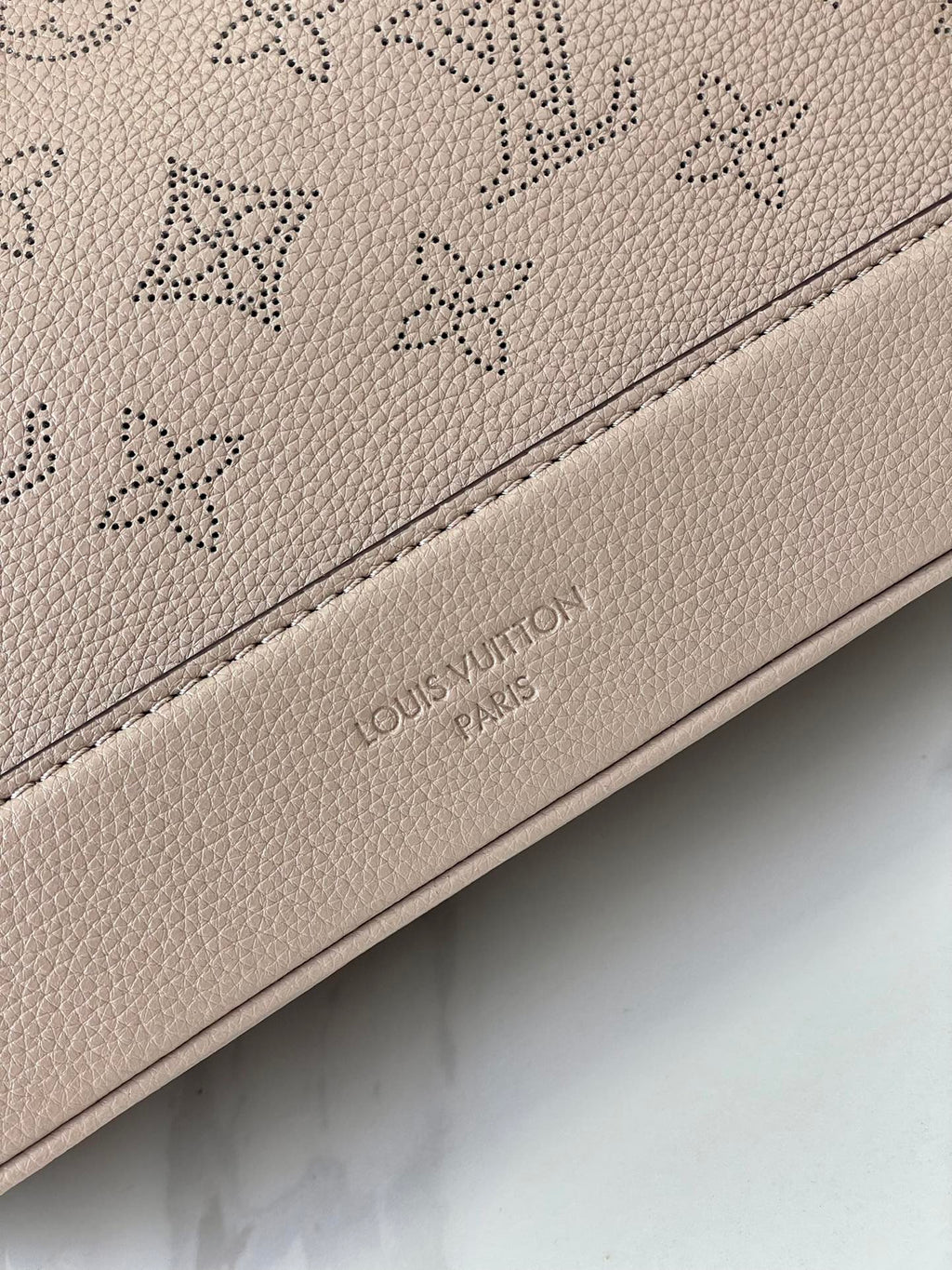 LOUIS VUITTON FLORE 28 IN GALET PERFORATED CALFSKIN