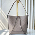 LOUIS VUITTON FLORE 28 IN GALET PERFORATED CALFSKIN