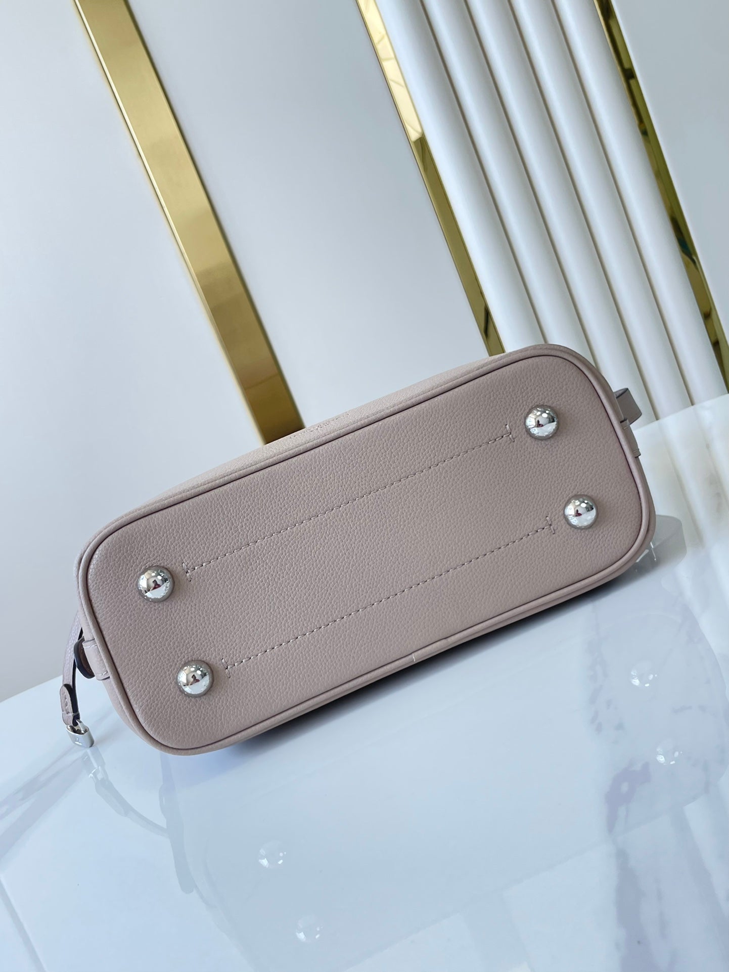 LOUIS VUITTON FLORE 28 IN GALET PERFORATED CALFSKIN