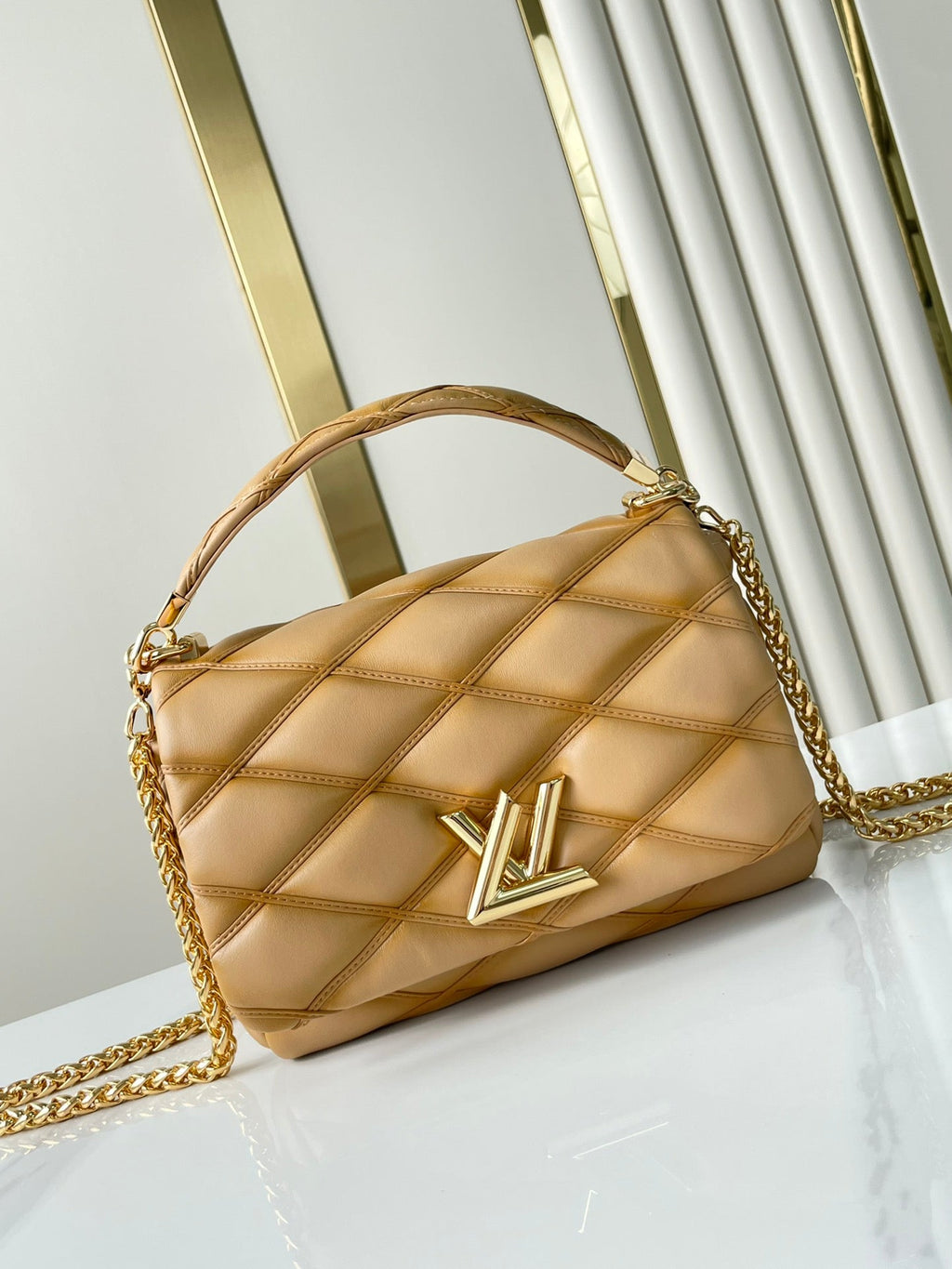 LOUIS VUITTON GO-14 PM 20 IN LIGHT FAWN QUILTED LAMBSKIN GOLD HARDWARE