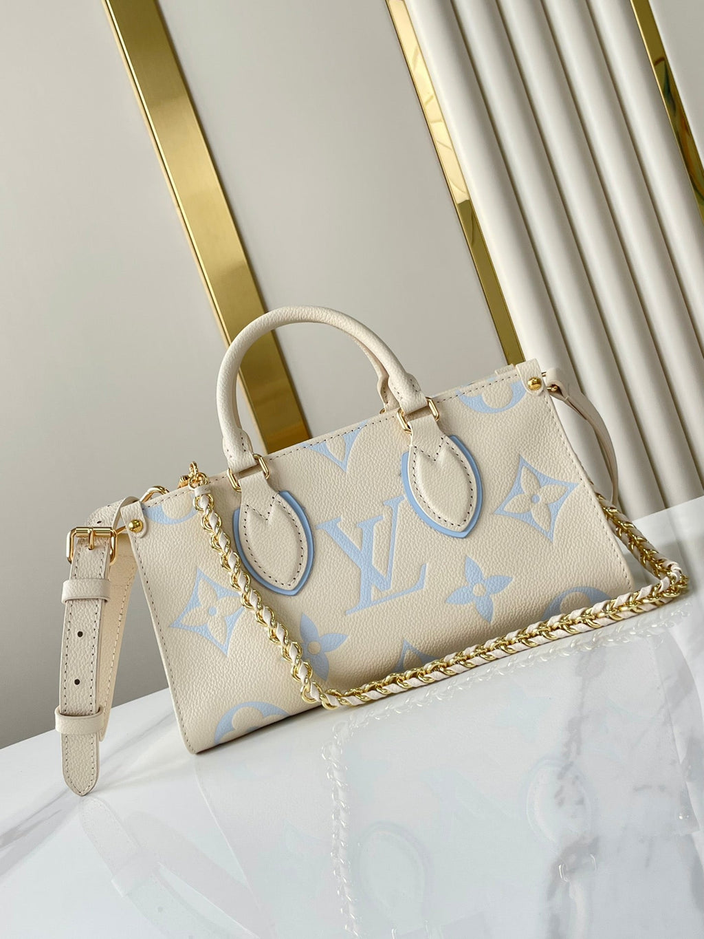 LOUIS VUITTON ONTHEGO 25 IN CREAM BLUE CALFSKIN GOLD HARDWARE