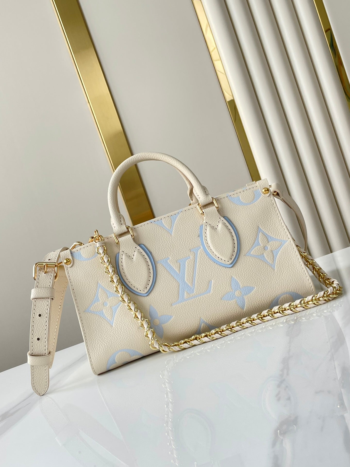 LOUIS VUITTON ONTHEGO 25 IN CREAM BLUE CALFSKIN GOLD HARDWARE