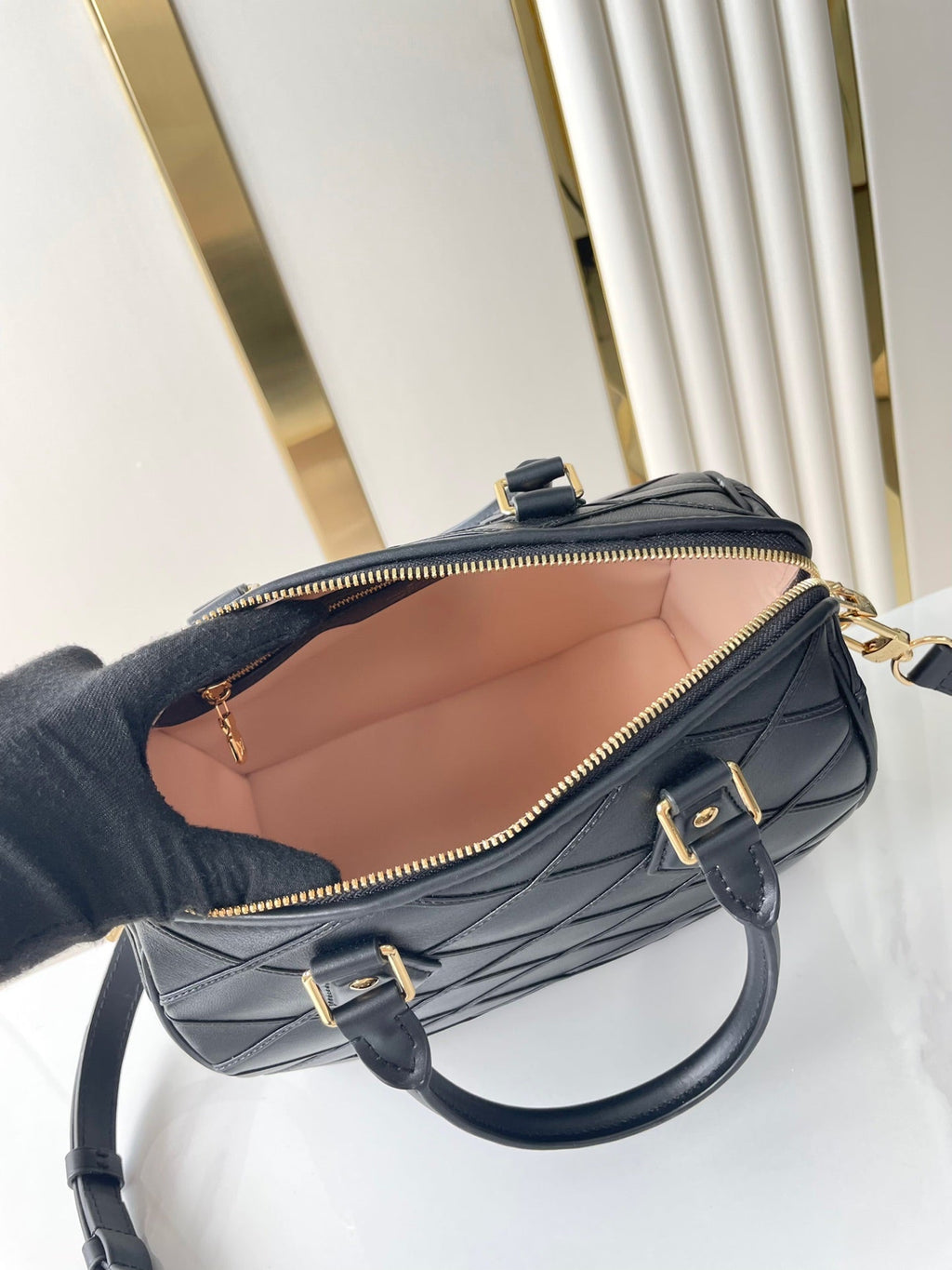 LOUIS VUITTON SPEEDY BANDOULIÈRE 25 WITH CRISS CROSS PATTERN IN BLACK LAMBSKIN