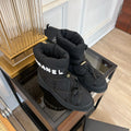 CHANEL SKI BOOTS IN BLACK QUILTED COTTON