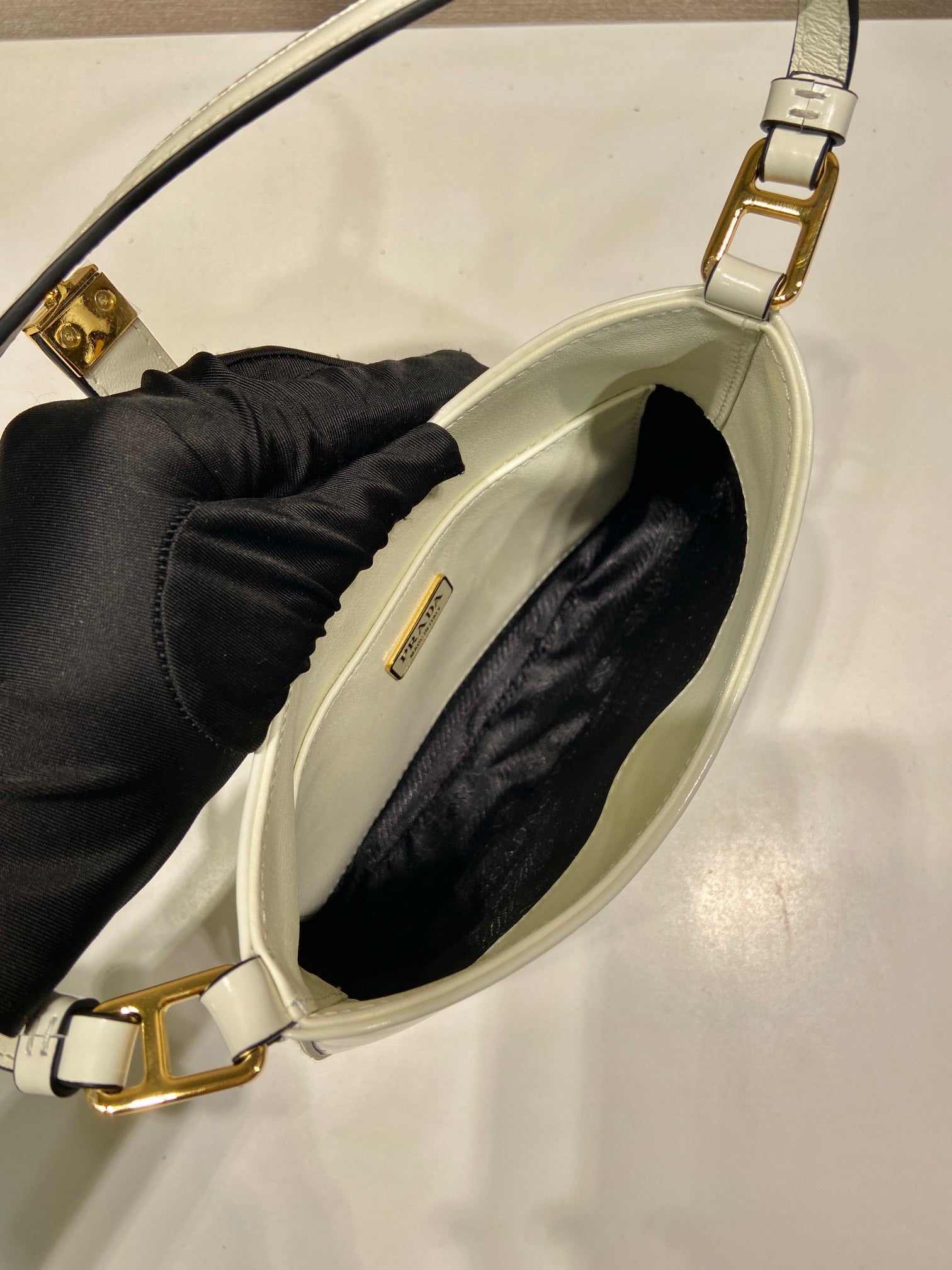PRADA CLEO SHOULDER BAG 22 IN WHITE BRUSHED LAMBSKIN WITH CLASP CLOSURE