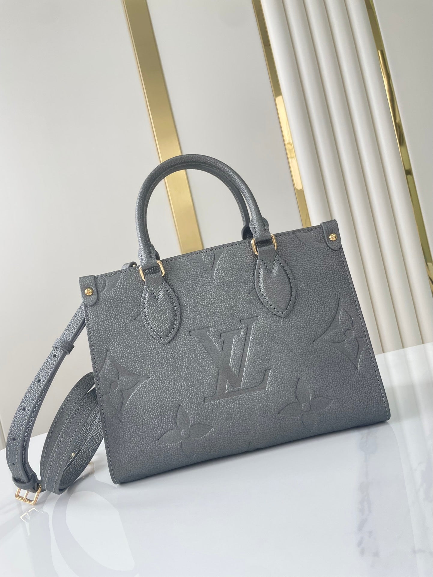 LOUIS VUITTON ONTHEGO PM 25 IN GUN METAL EMBOSSED CALFSKIN