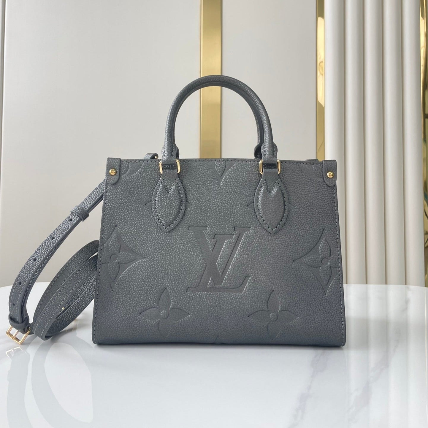 LOUIS VUITTON ONTHEGO PM 25 IN GUN METAL EMBOSSED CALFSKIN