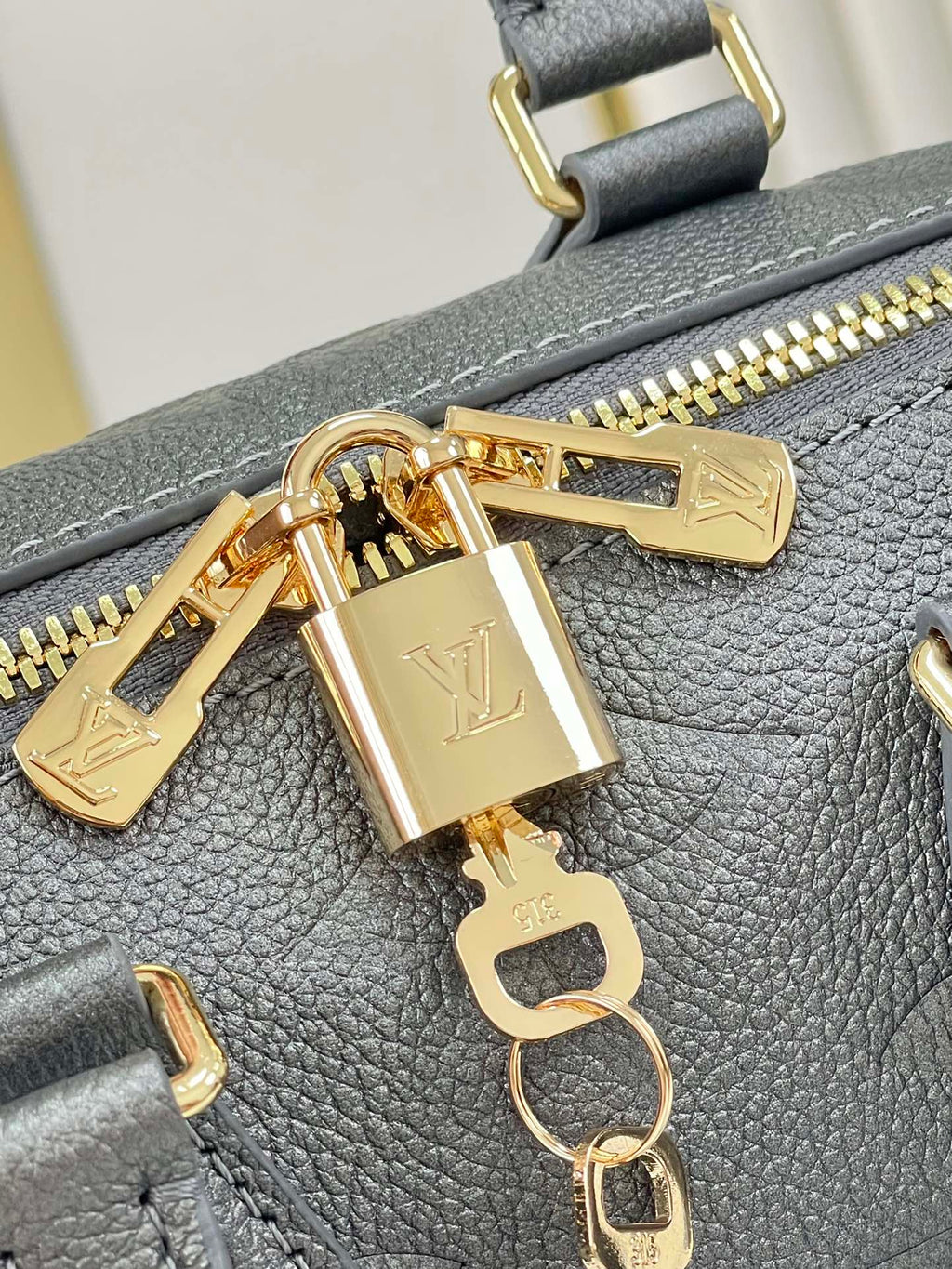 LOUIS VUITTON SPEEDY BANDOULIÈRE 20 IN GUN METAL MONOGRAM EMPREINTE GOLD HARDWARE