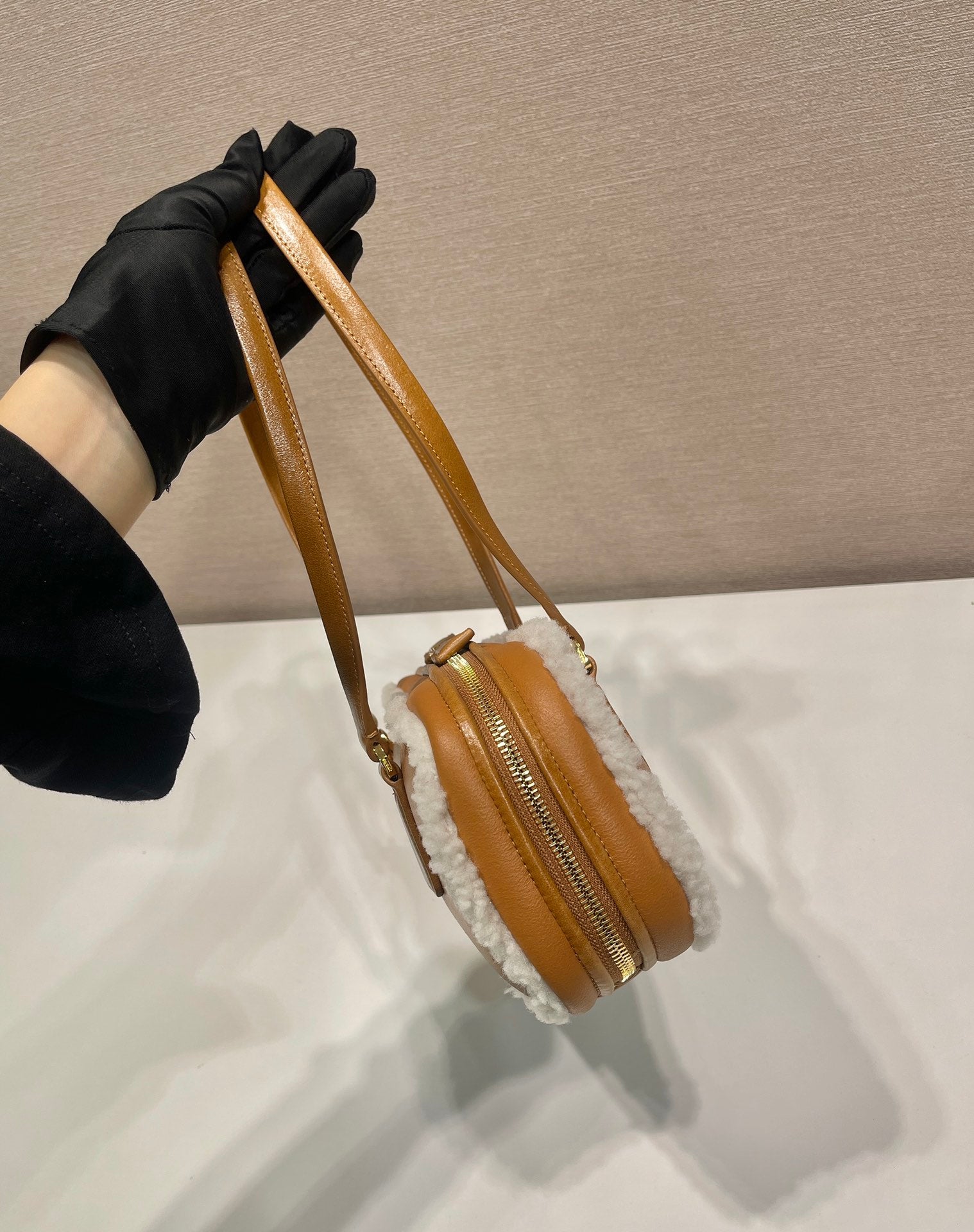 PRADA TOP HANDLE BAG 27 IN BRONZE BROWN SHEEPSKIN AND SHEARLING TRIM