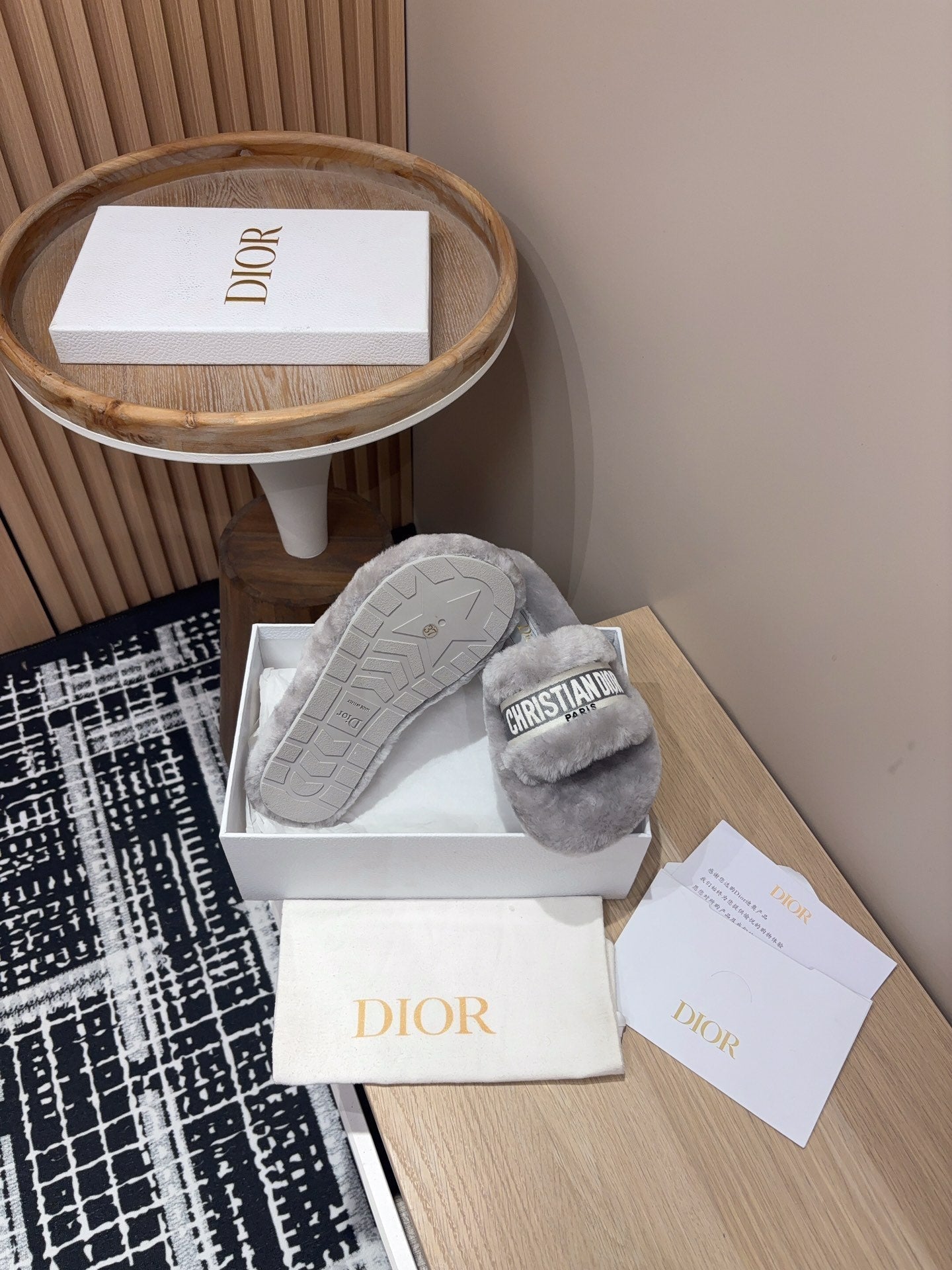 DIOR THICK-SOLE SLIPPERS IN PALE GRAY SHEARLING WITH EMBROIDERED LOGO