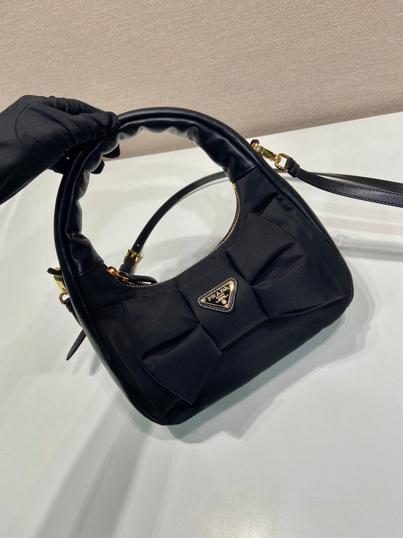 PRADA BOW HOBO BAG 22 IN BLACK RE-NYLON AND LAMBSKIN