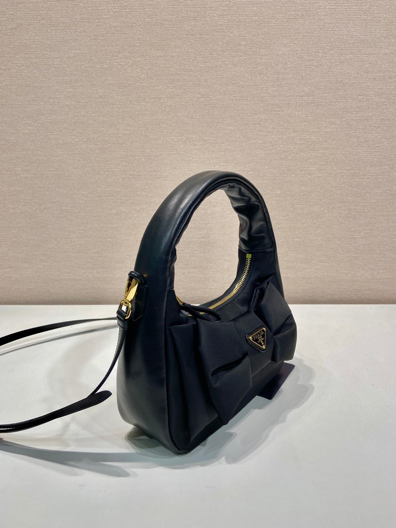 PRADA BOW HOBO BAG 22 IN BLACK RE-NYLON AND LAMBSKIN