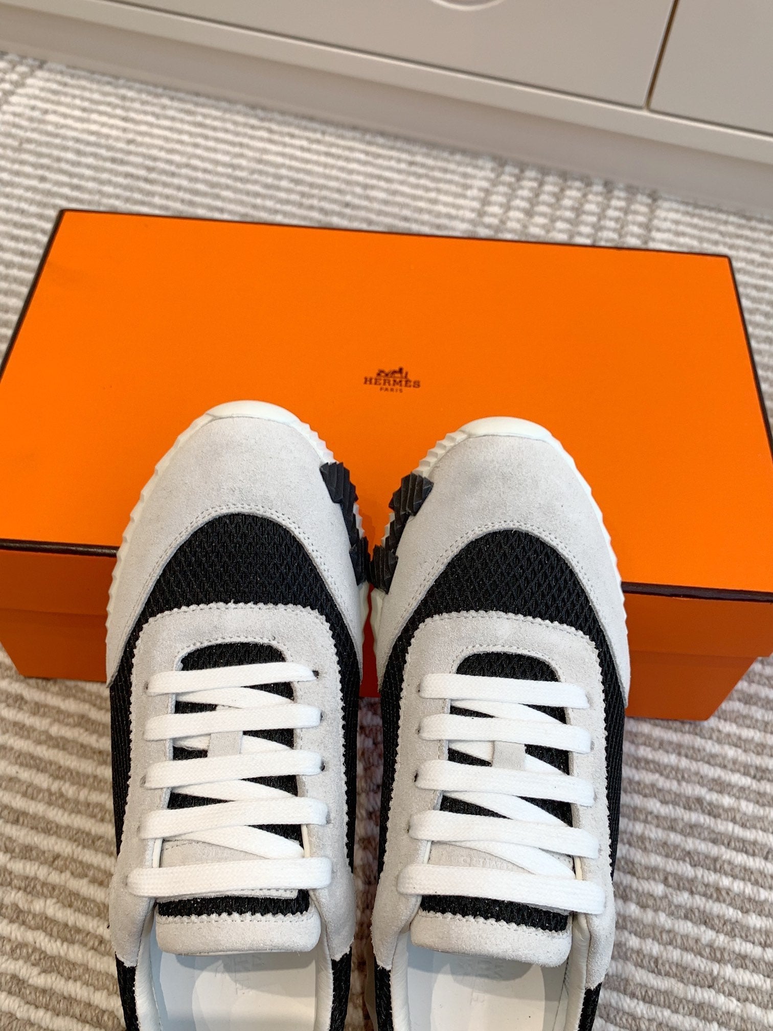 HERMES BOUNCING SNEAKER IN BLACK GRAPHIC MESH AND PASTEL GRAY SUEDE