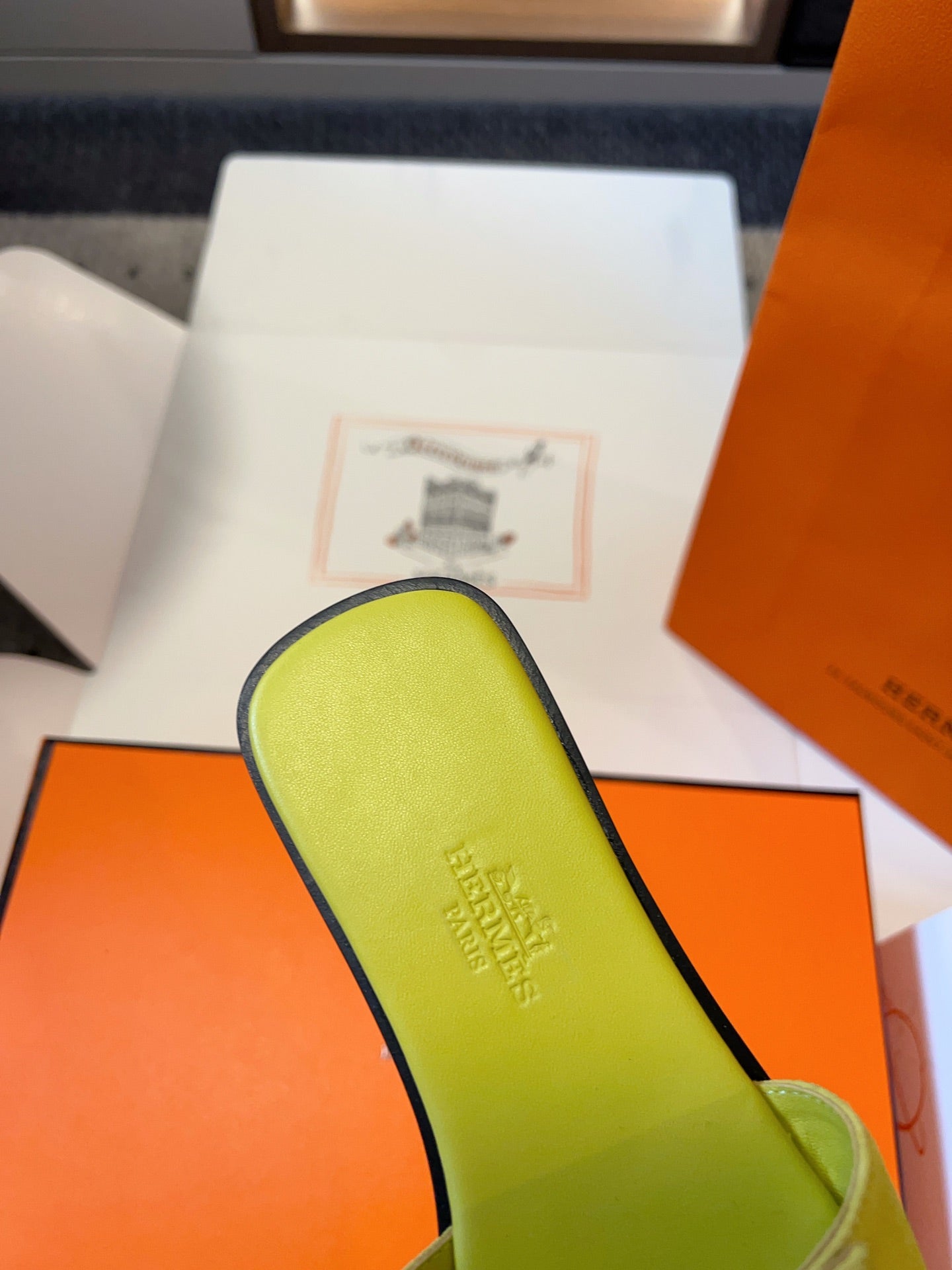 HERMES GIULIA FLAT SANDAL IN NEON YELLOW SUEDE