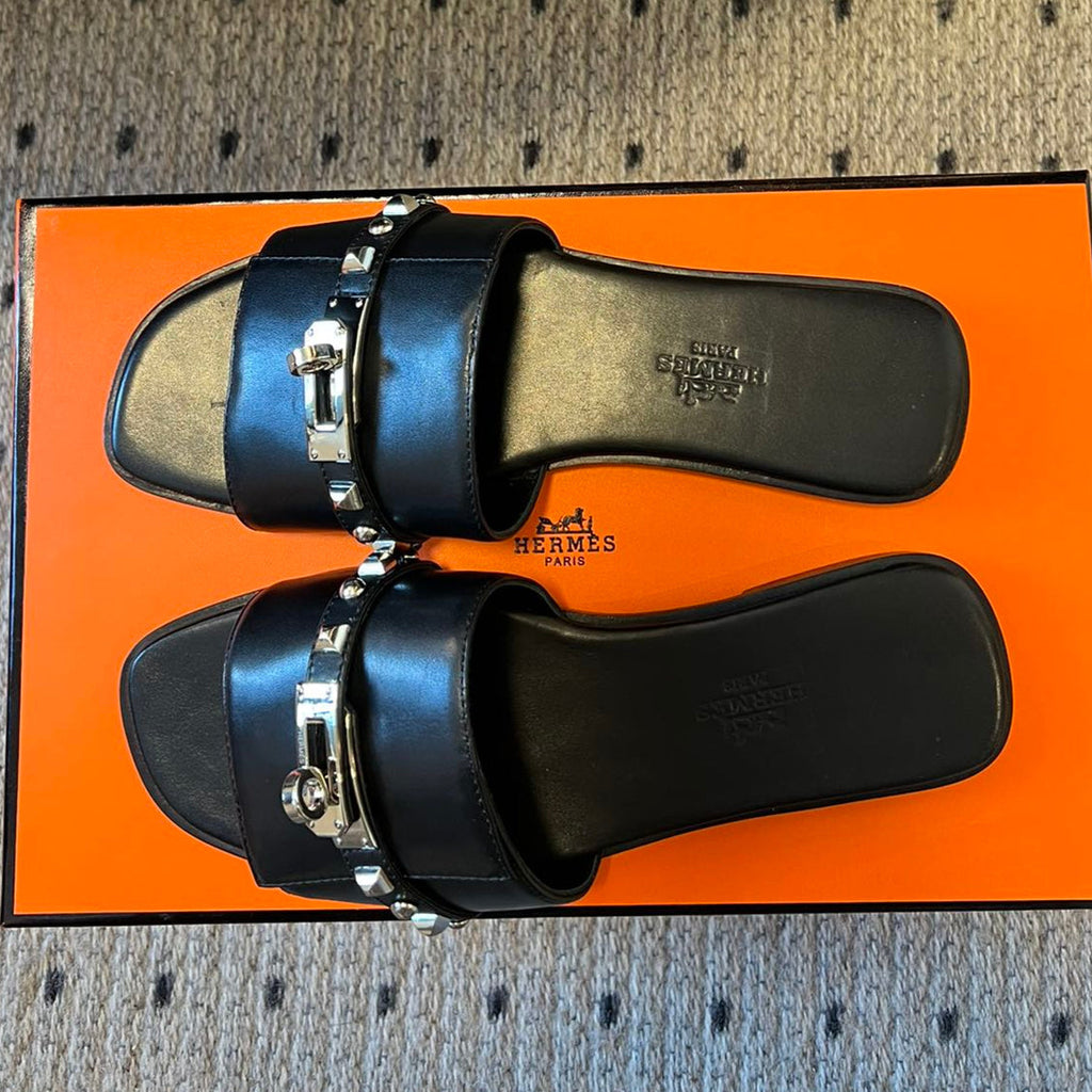 HERMES GIULIA FLAT SANDAL IN BLACK CALFSKIN