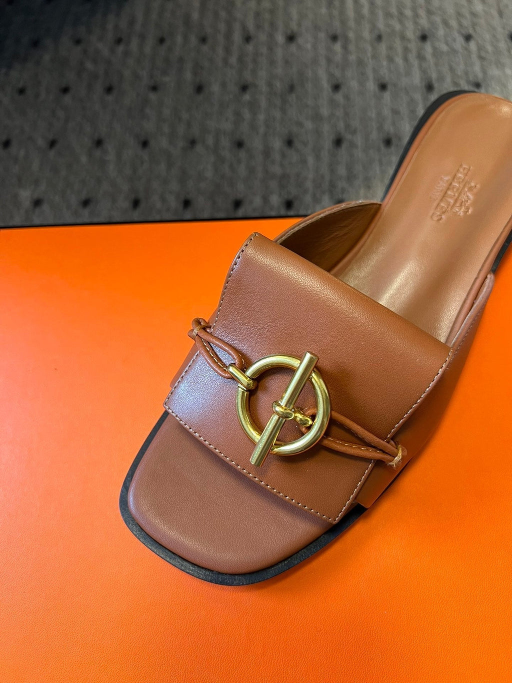 HERMES ILOT FLAT SANDAL IN BRONZE BROWN CALFSKIN