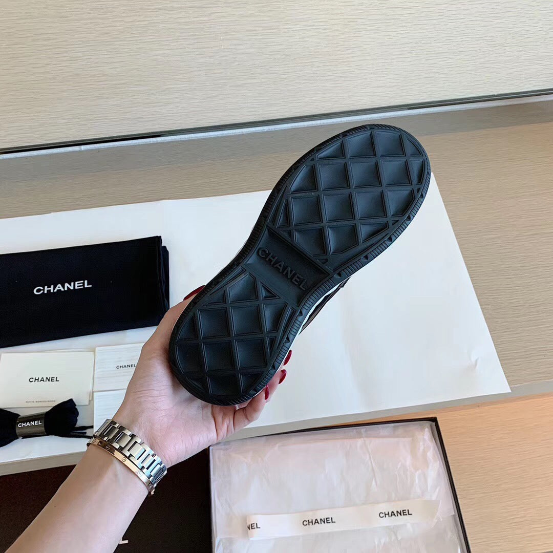 CHANEL Bubble Quilted Trainer Sneaker Black White